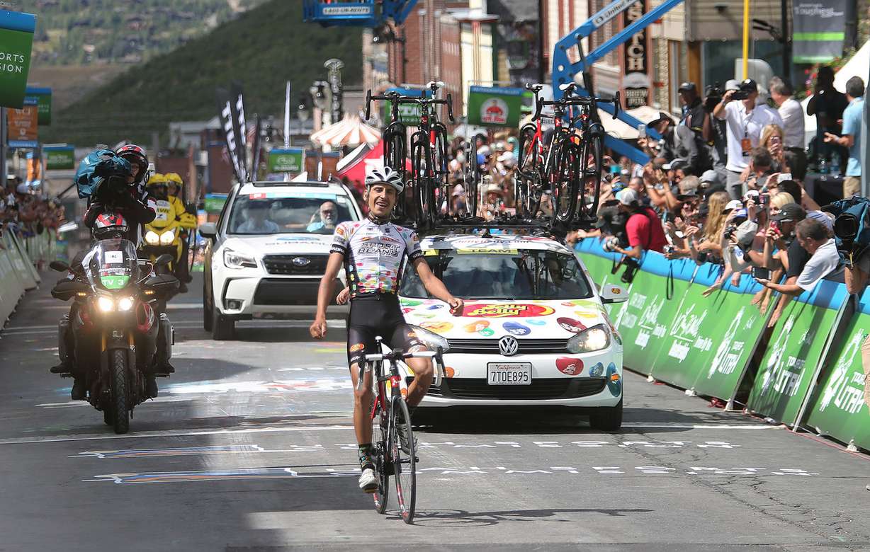 Lachlan Morton celebrates as he crosses the finish line, winning the Larry H. Miller Tour of Utah in Park City on Sunday, Aug. 7, 2016. (Photo: Scott G Winterton, Deseret News)