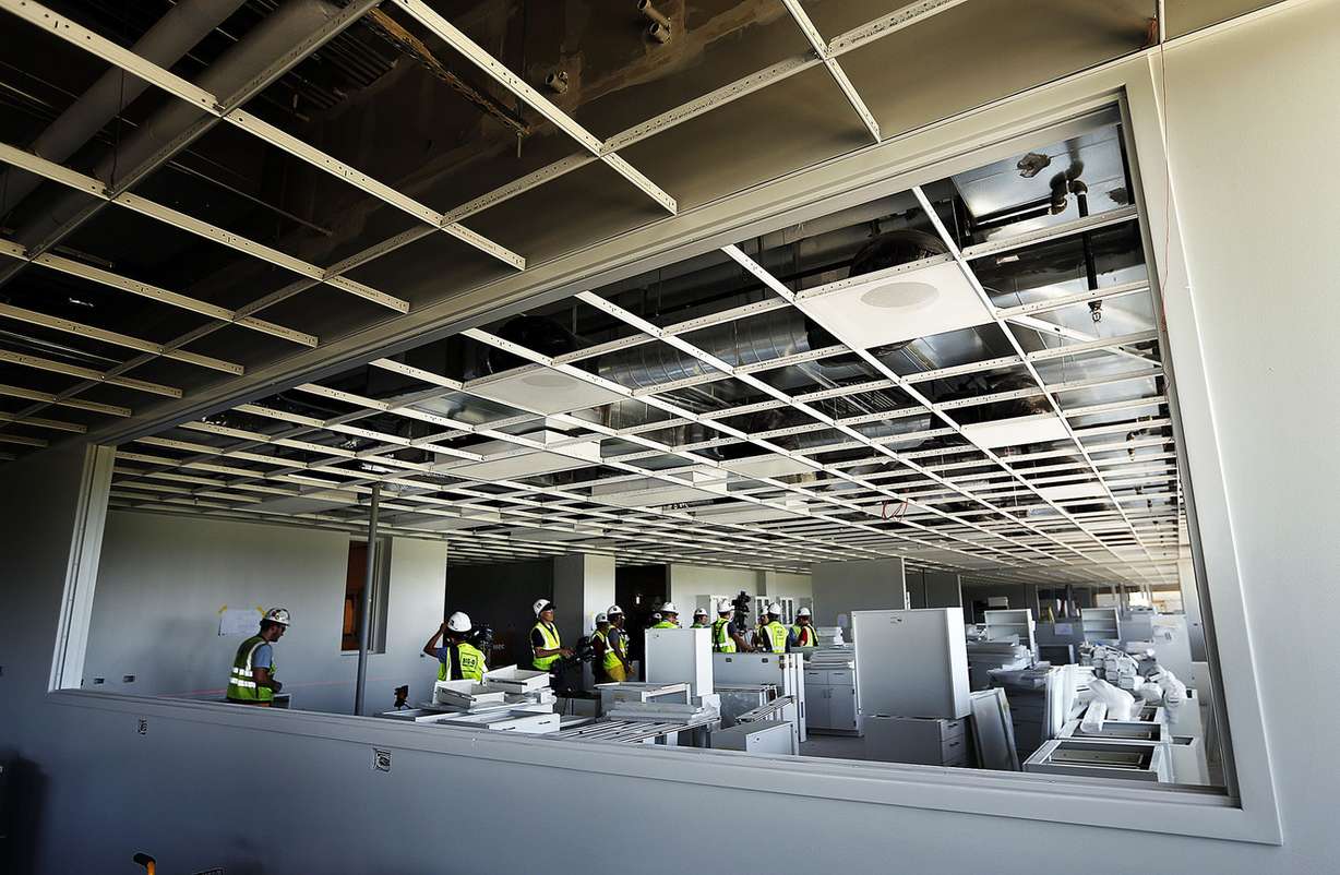 Members of the media visit what will be the serology lab during a tour of the new Utah State Crime Lab's Module 2 in Taylorsville on Tuesday, Aug. 9, 2016. The new $41 million, 90,000-square-foot facility is expected to be completed this winter. (Photo: Ravell Call, Deseret News)