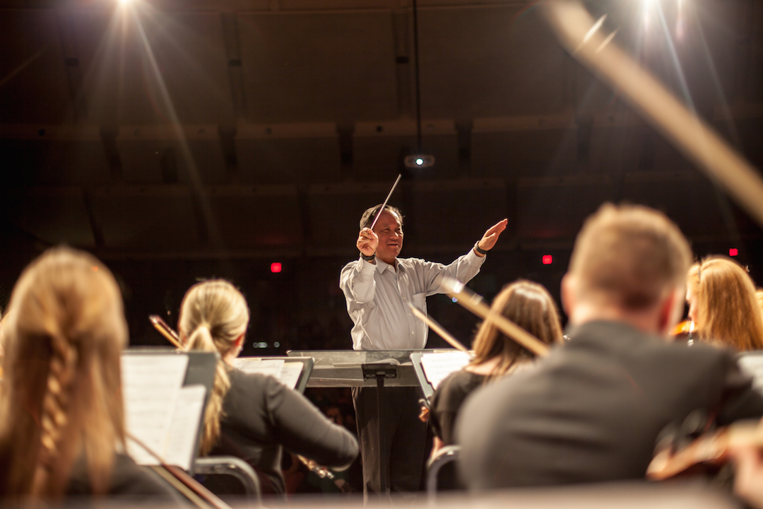 150 Springville High alumni surprise retired orchestra teacher with concert
