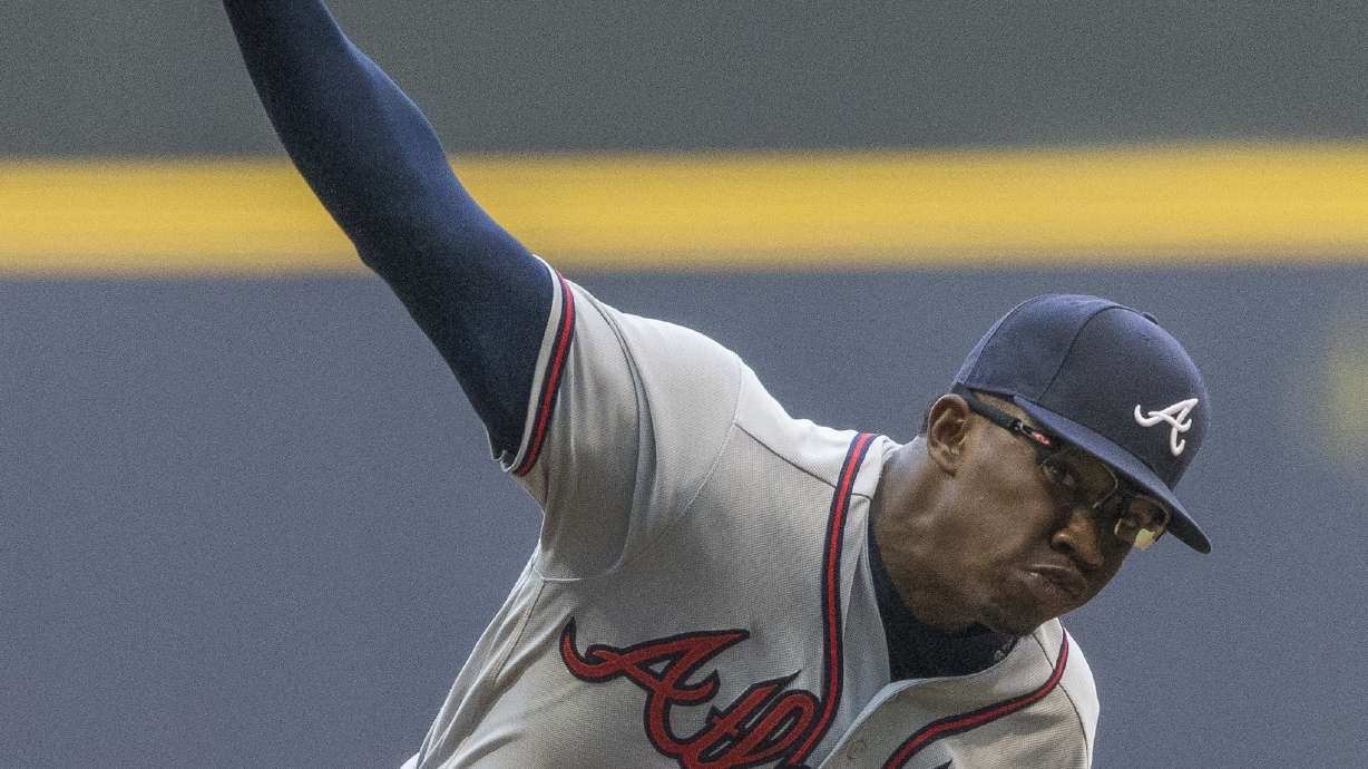 Jenkins throws 6 strong innings, Braves beat Brewers 2-1