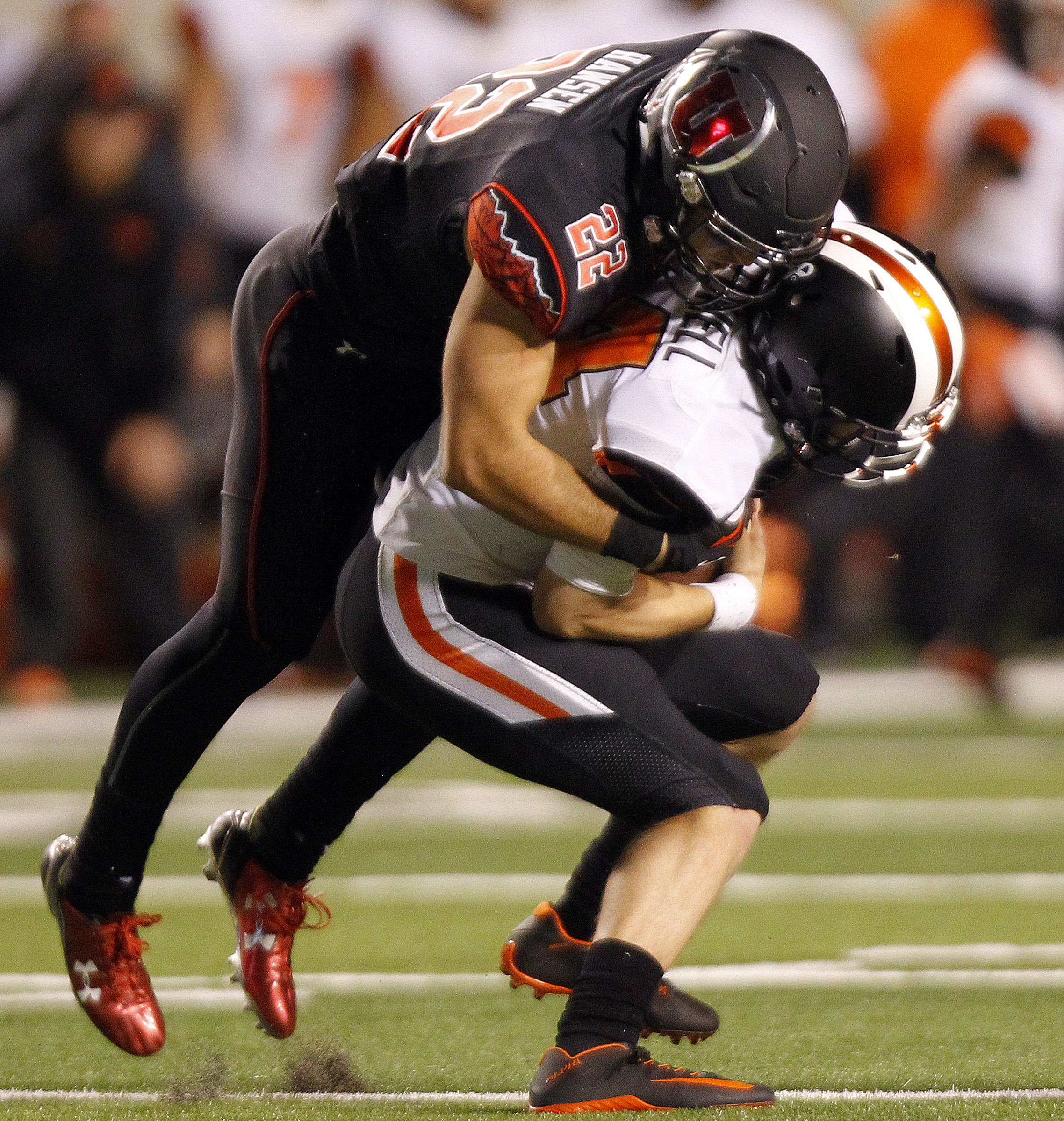 Utah safety Chase Hansen (22) makes a sack on Oregon State Beavers quarterback Nick Mitchell (14) during a Pac-12 football game at Rice-Eccles Stadium in Salt Lake City, Saturday, Oct. 31, 2015. (Photo: Chris Samuels, Deseret News)