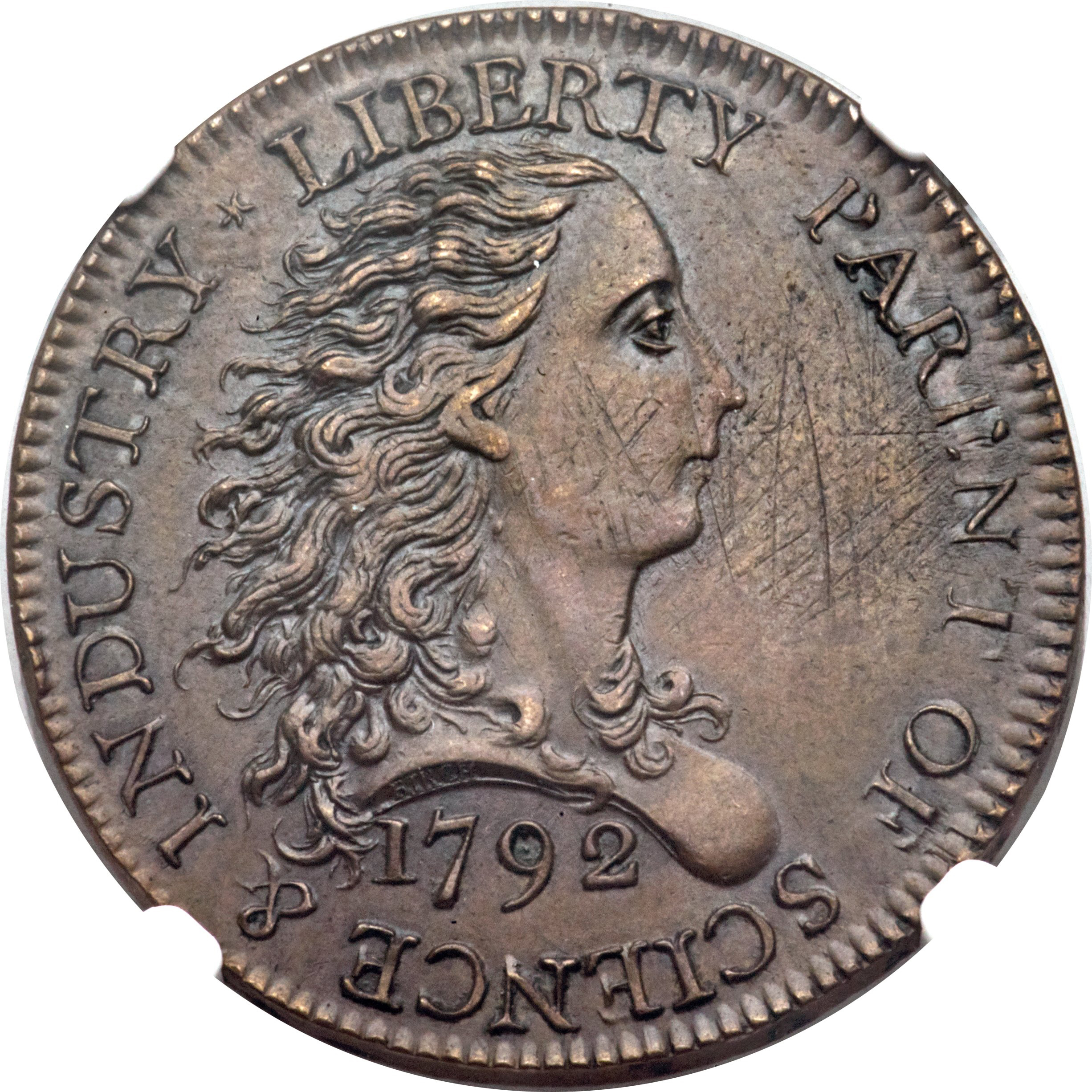 The Latest: 2 early US 1-cent coins sell for $869,500
