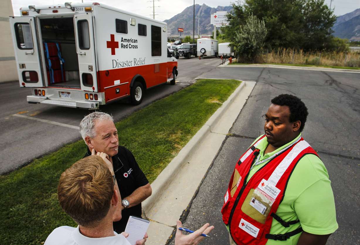 Michael Smauldon, executive coordinator of the American Red Cross, talks with media in Salt Lake City during the wake of severe flooding in Baton Rouge, La., on Monday, Aug. 15, 2016. Smauldon is part of the response team from Utah that is going to Baton Rouge to help residents. (Photo: Weston Kenney, Deseret News)