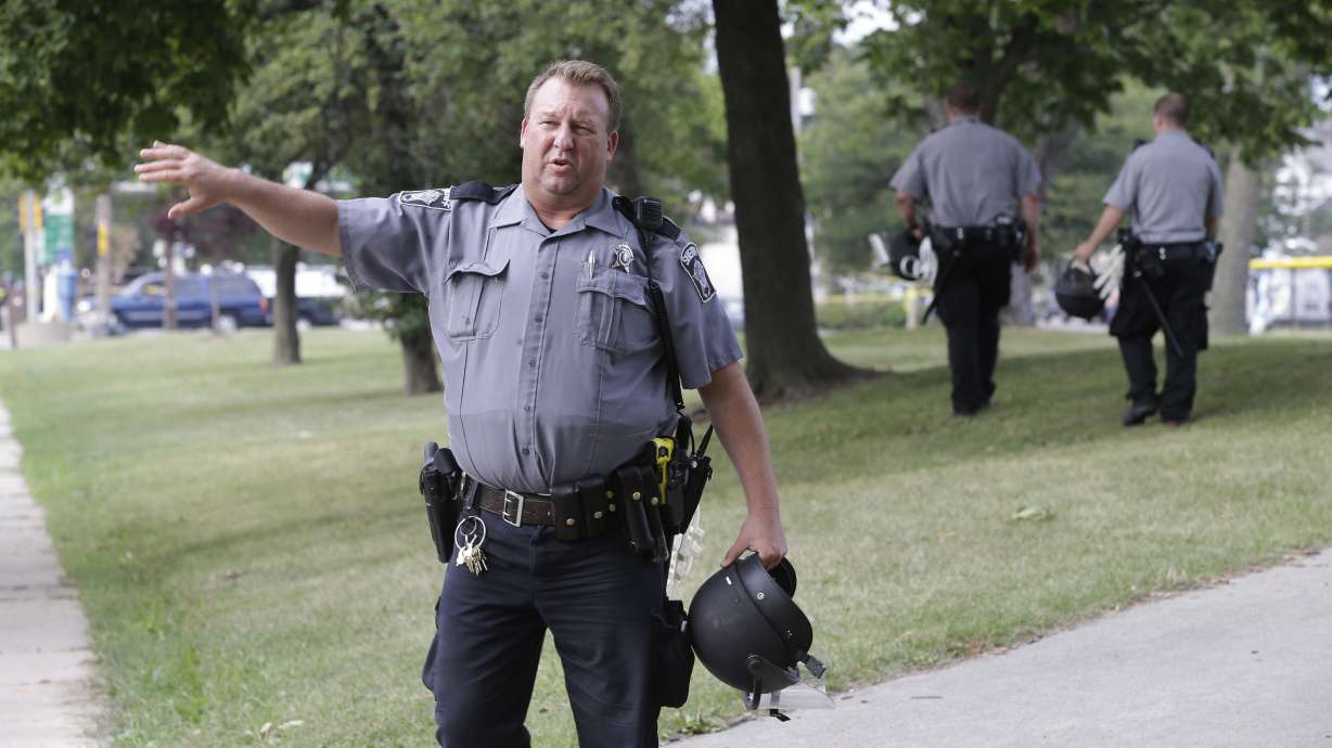 Latest: Milwaukee officer threatened online after shooting