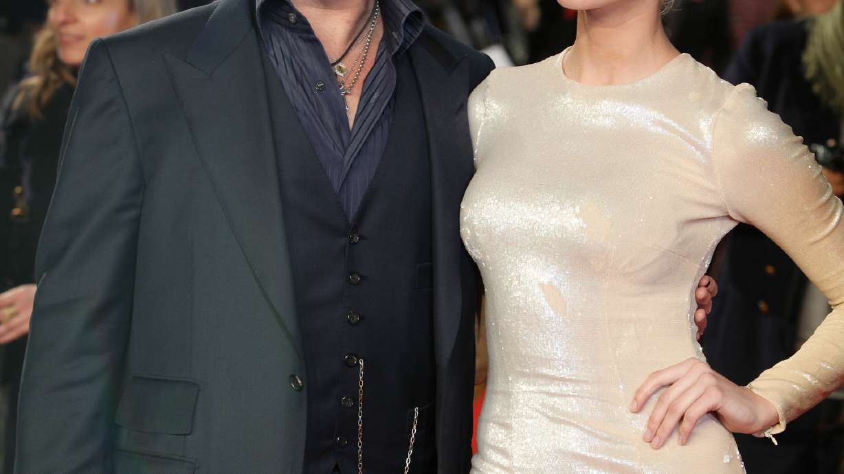 Johnny Depp and Amber Heard settle divorce case