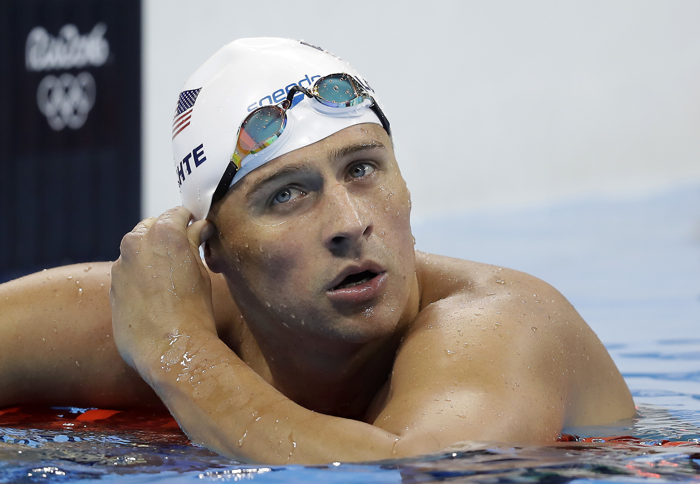 2 Lochte teammates in robbery probe pulled off plane
