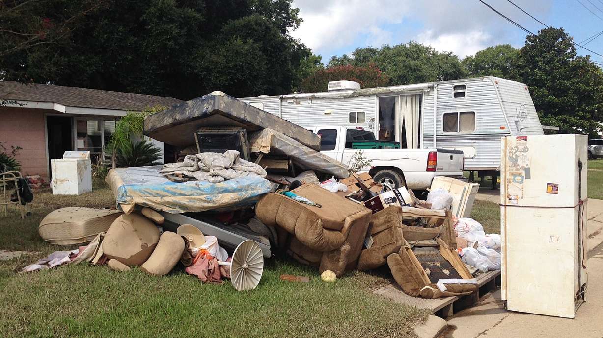 The Latest: State to cut wildlife-area levees to ease floods