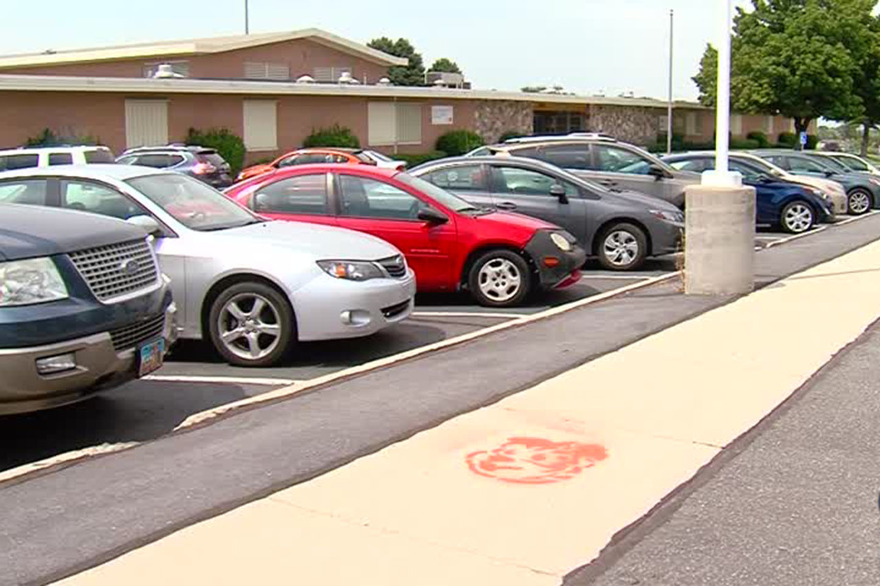 Spray paint on sidewalks helps keep students safe