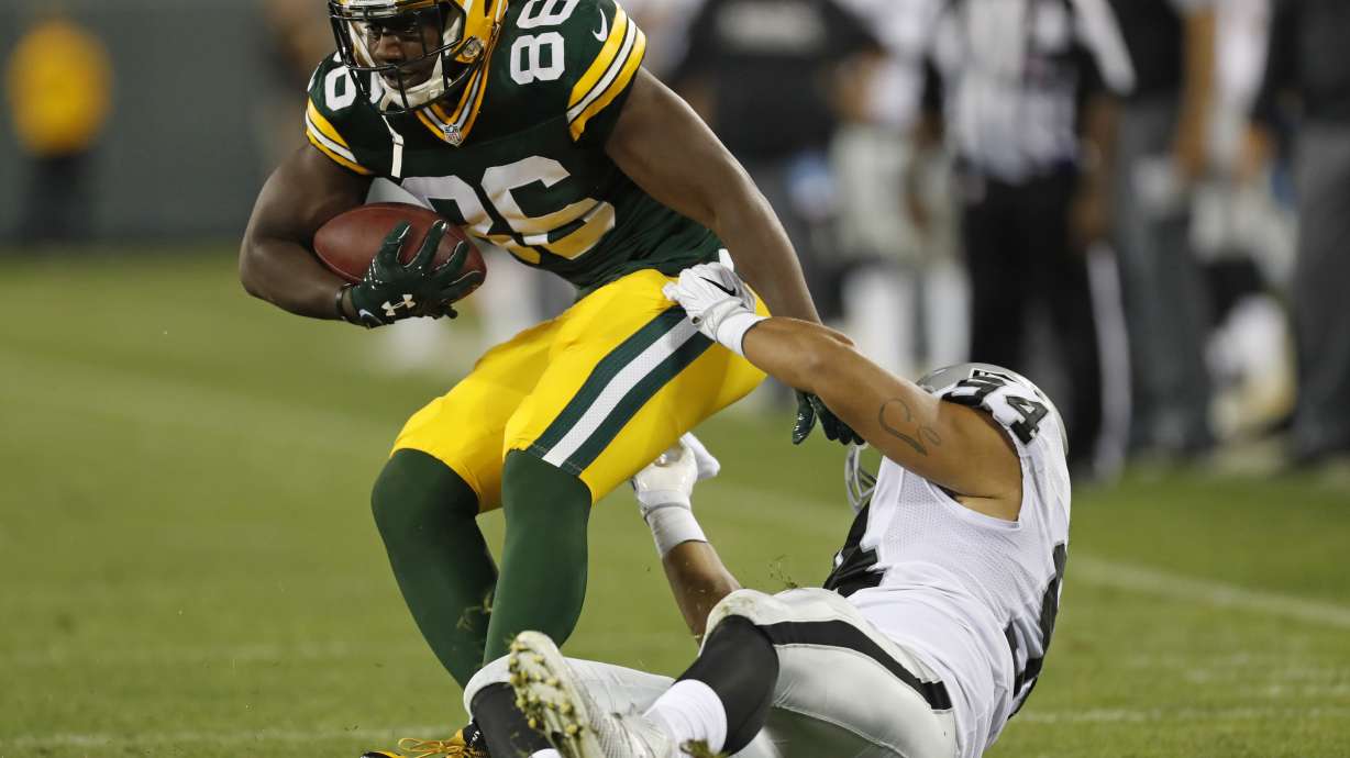 Lacy helps power Packers past Raiders 20-12