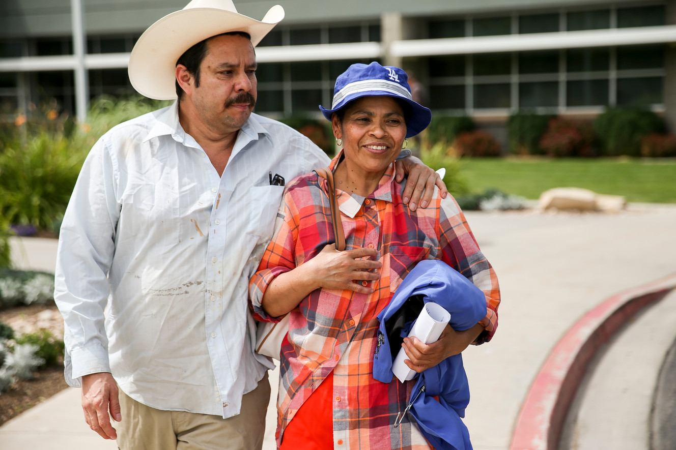 Martin Chairez-Castrejon walks with his arm around his wife, Lorena Gonzalez, after being released from the Utah County Jail in Spanish Fork on Friday, July 8, 2016. (Photo: Spenser Heaps, Deseret News)