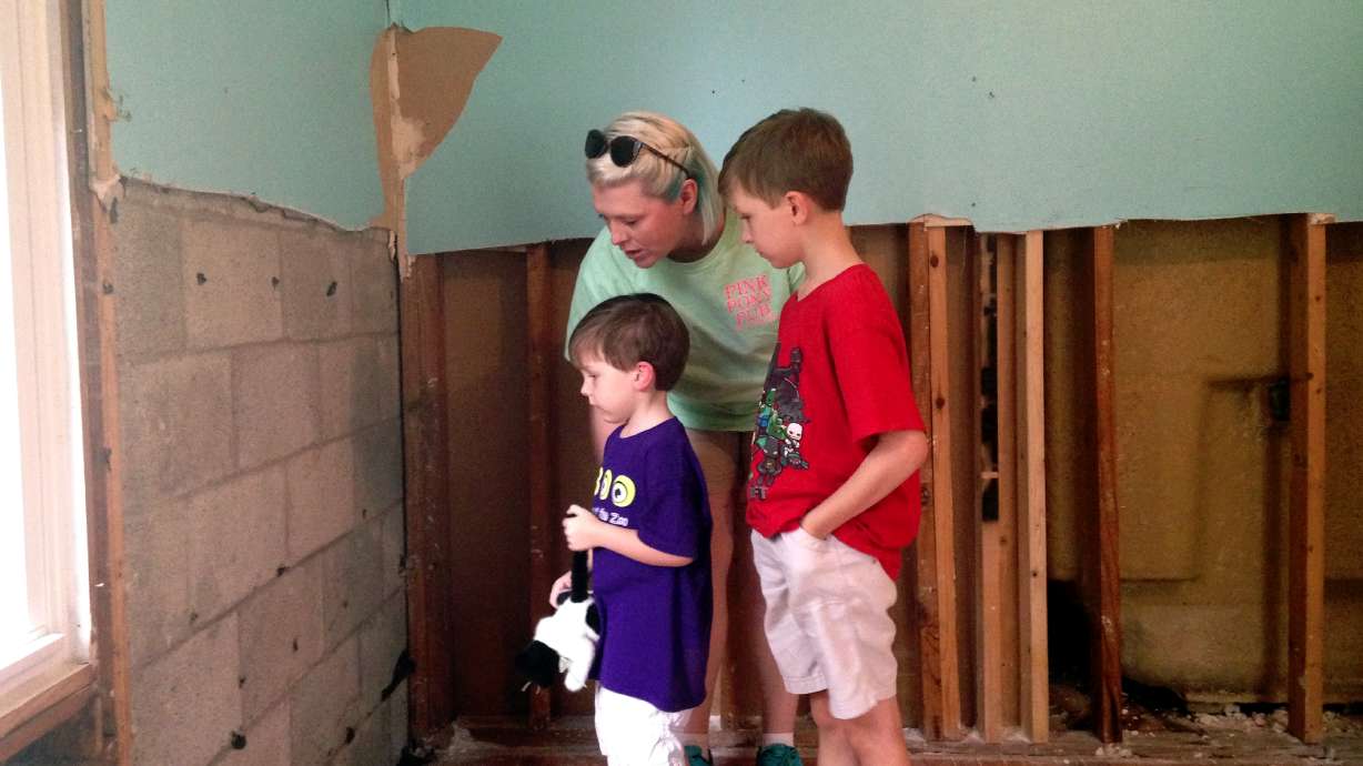 Amid Louisiana flood disaster, youngest bear mental scars