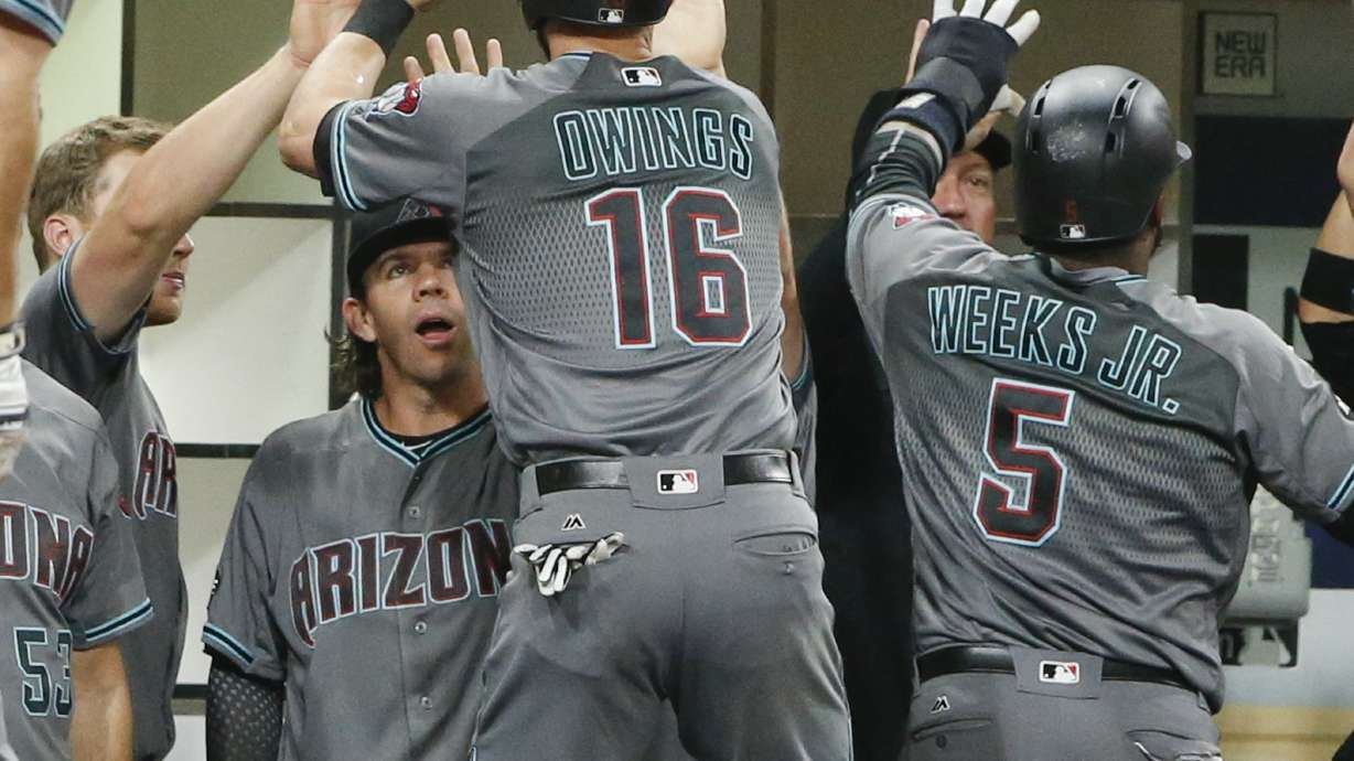 Schimpf's 2 homers lead Padres over Diamondbacks, 7-4 in 10