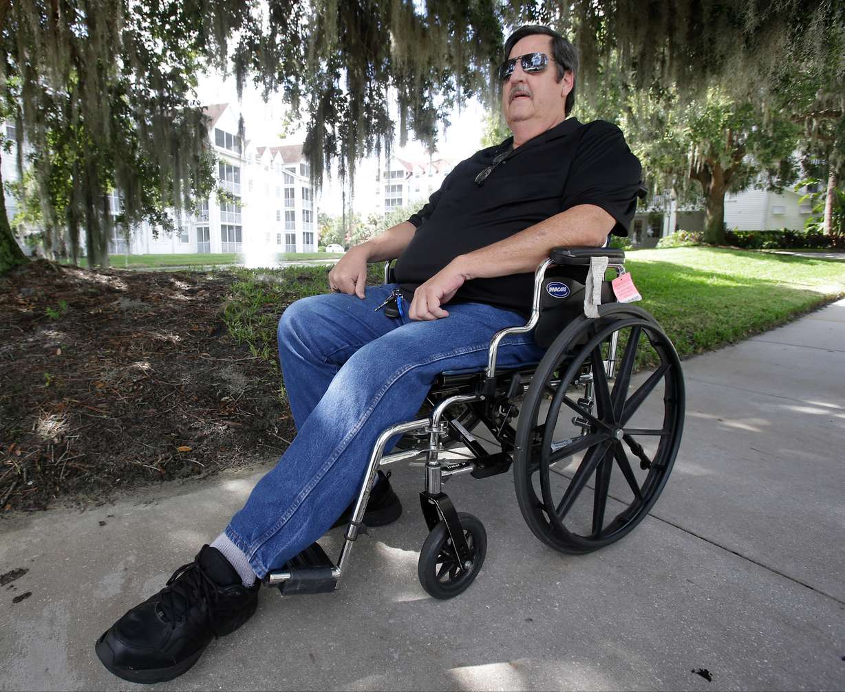 Bruce Bradford spends time outdoors during a holiday visit in Orlando, Fla., on Thursday, June 23, 2016. In January, the 58-year-old longtime Republican and Donald Trump supporter qualified for Social Security disability, which allowed him to buy health insurance through the Affordable Care Act. (John Raoux, AP Photo)