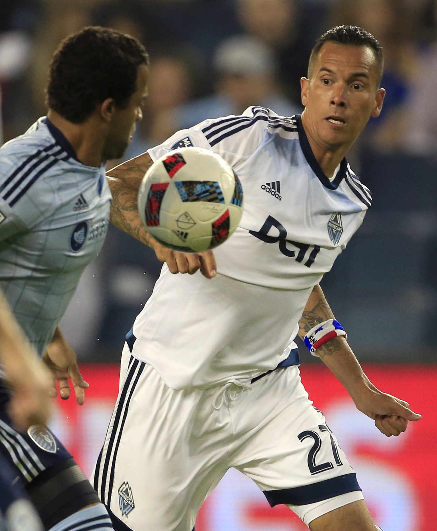 Peterson, Feilhaber lead Sporting KC past Whitecaps, 2-0