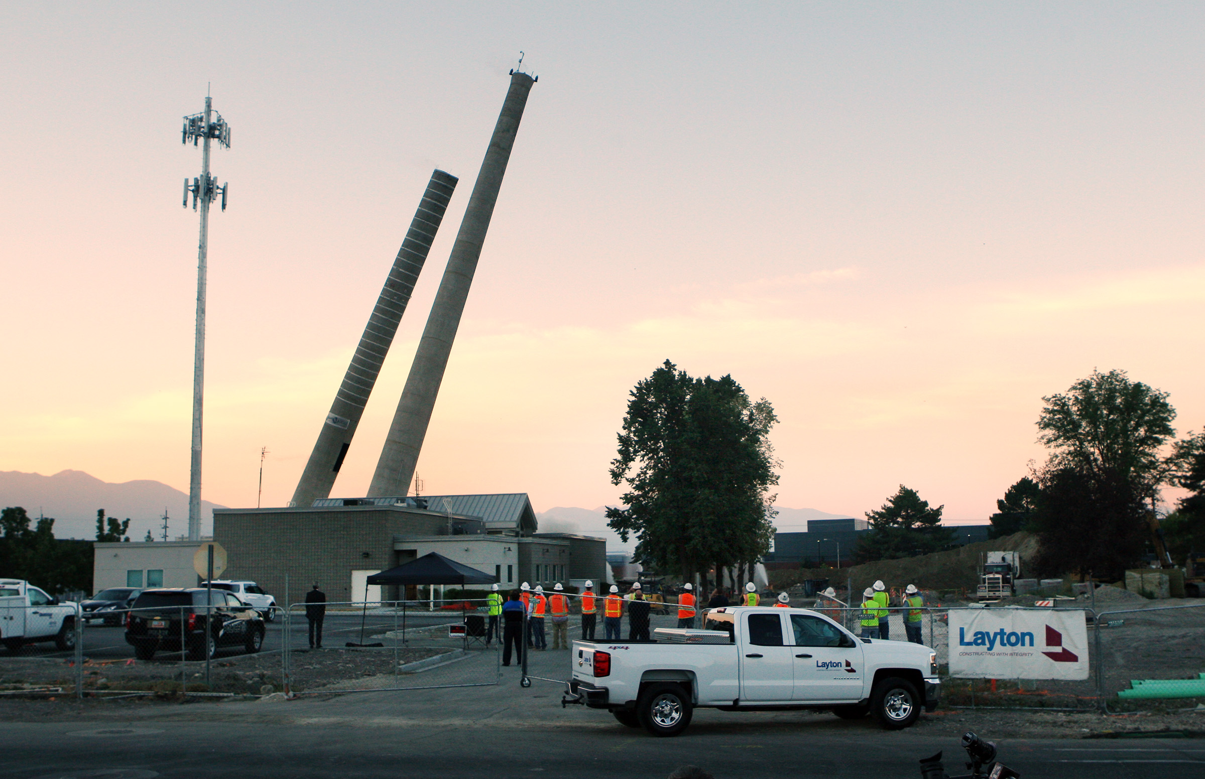 The 77-year-old Provo Power smokestacks begin their fall as Provo residents turn out to watch on Sunday, Aug. 21, 2016. (Photo: Scott G. Winterton, Deseret News)