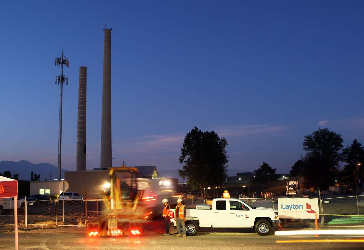 Crews prepare as Provo residents turn out to watch as the 77-year-old Provo Power smokestacks are demolished on Sunday, Aug. 21, 2016. (Photo: Scott G. Winterton, Deseret News)