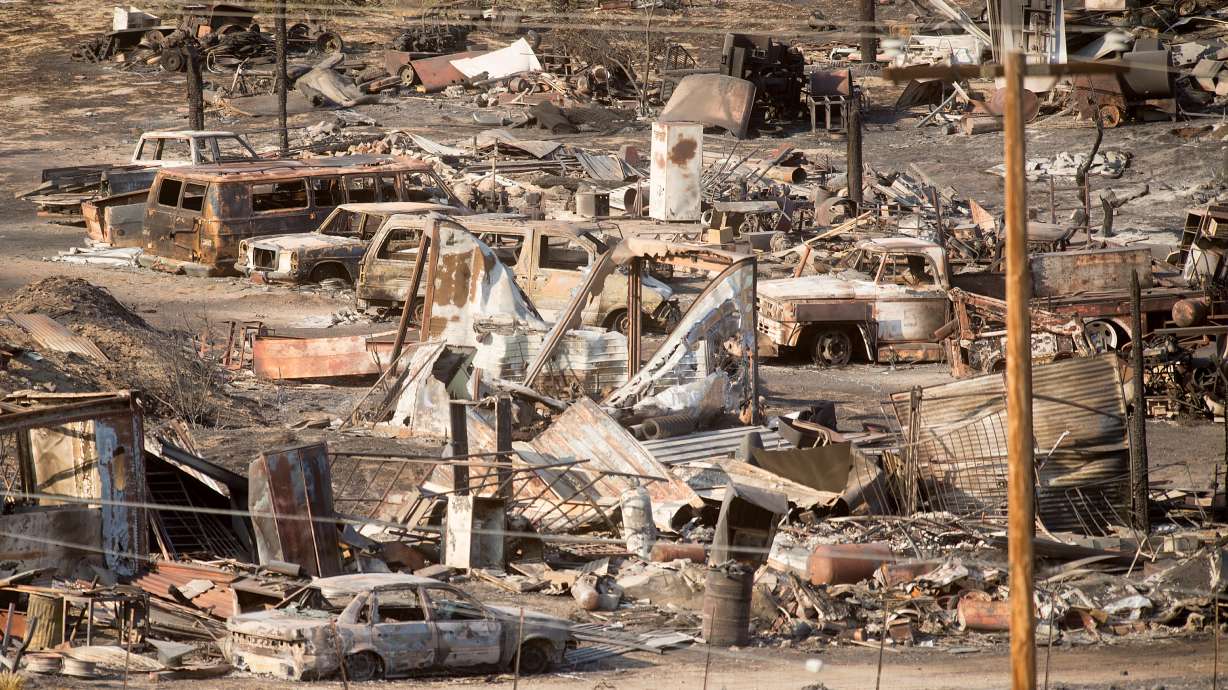 The Latest: All wildfire evacuees allowed to return home