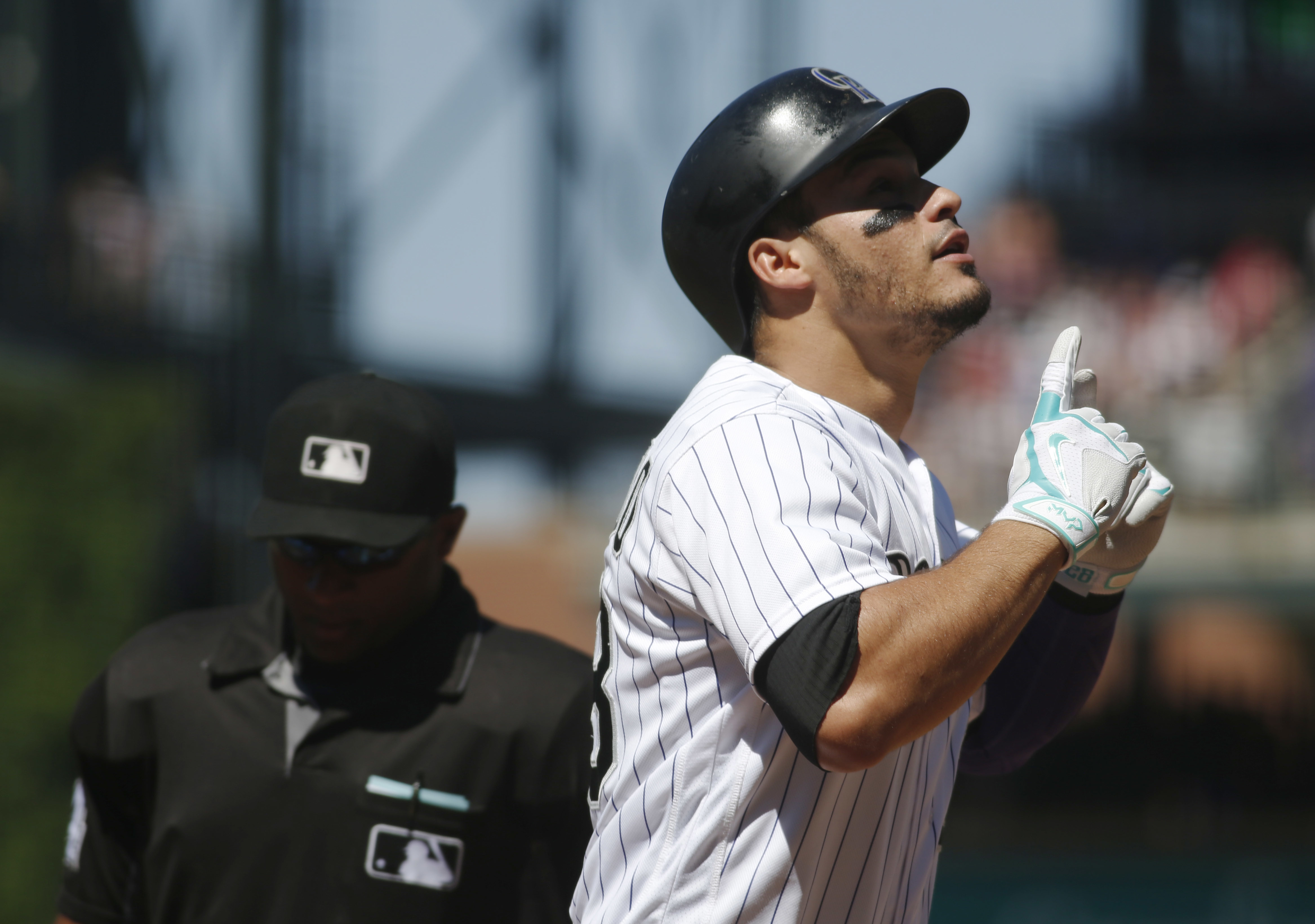 Arenado's 2 home runs, 6 RBIs power Rockies past Cubs