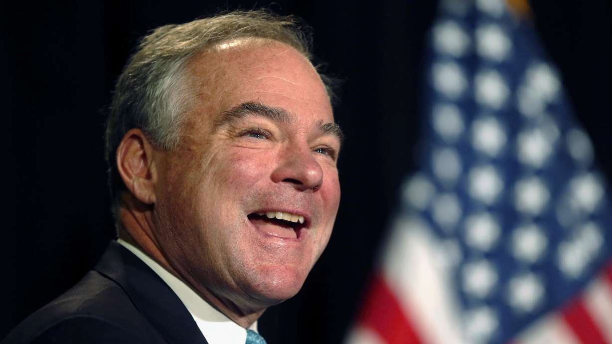 With father in tow, Kaine seeks support from union workers