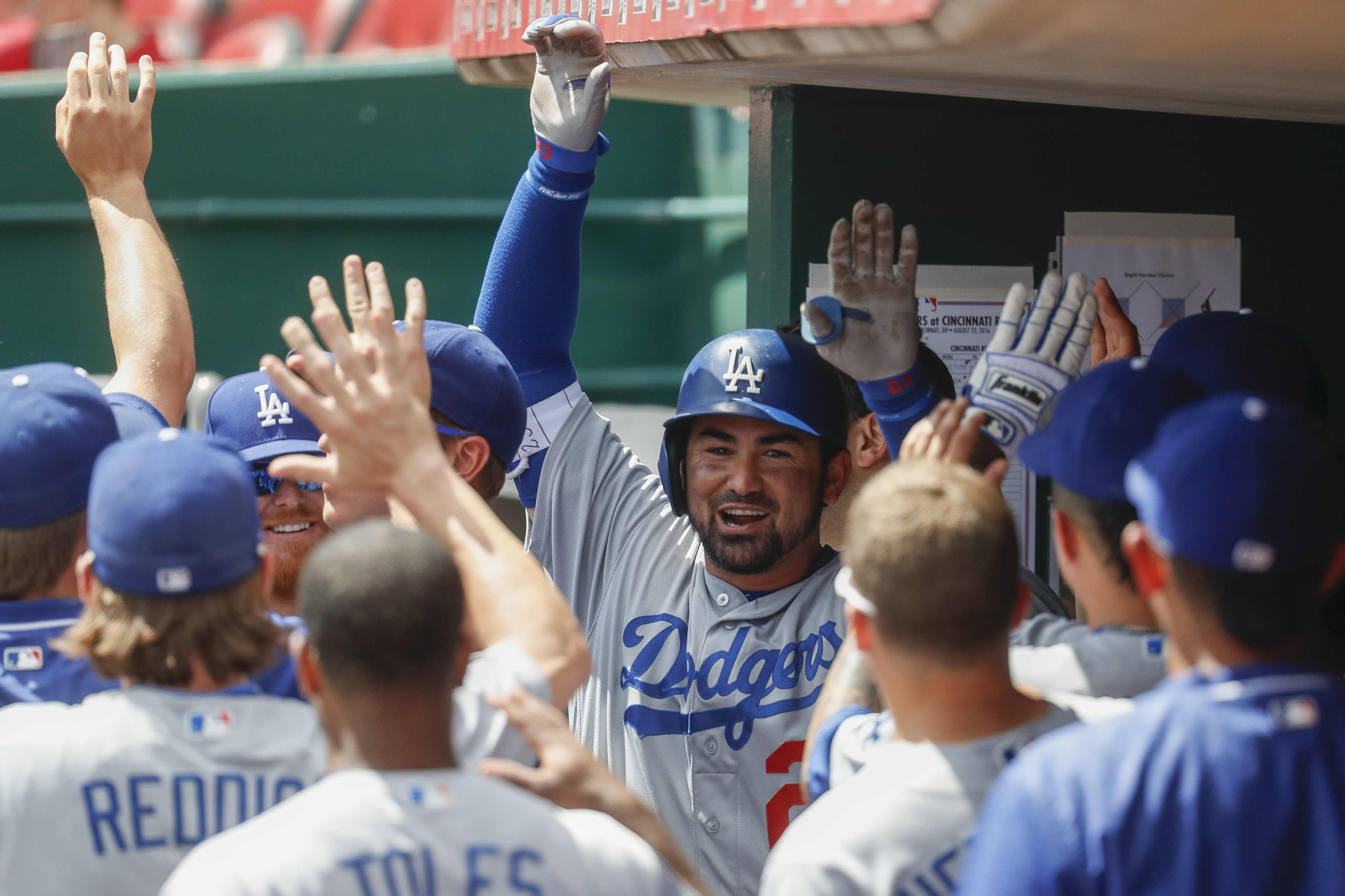 Gonzalez hits 3 of Dodgers' 7 homers for 18-9 win over Reds