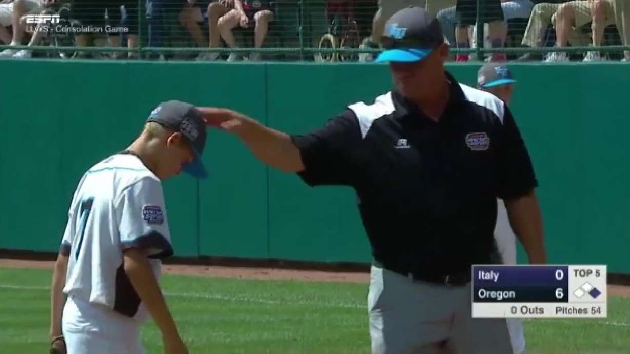 Little League coach/dad goes to the mound to tell his pitcher/son he loves him