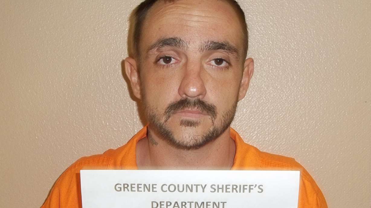 The Latest: 'Several' firearms, ax used in Alabama killings