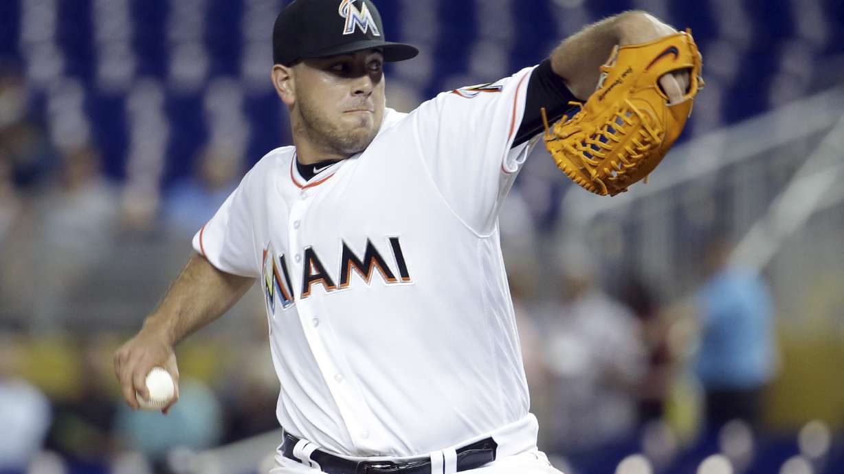Fernandez helps Marlins snap Royals' 9-game winning streak