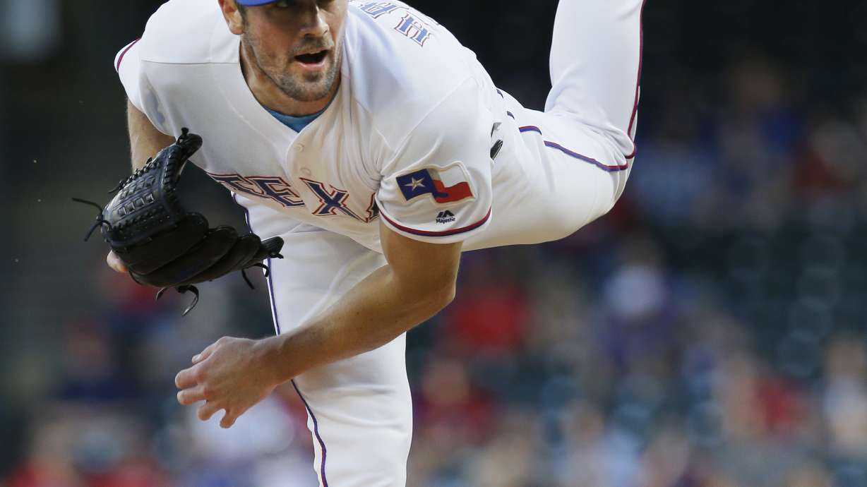 Hamels goes 8 innings for Texas in 9-0 win over Indians