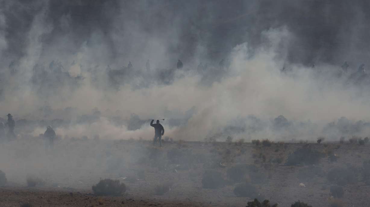 Bolivian president, opposition spar over official's killing