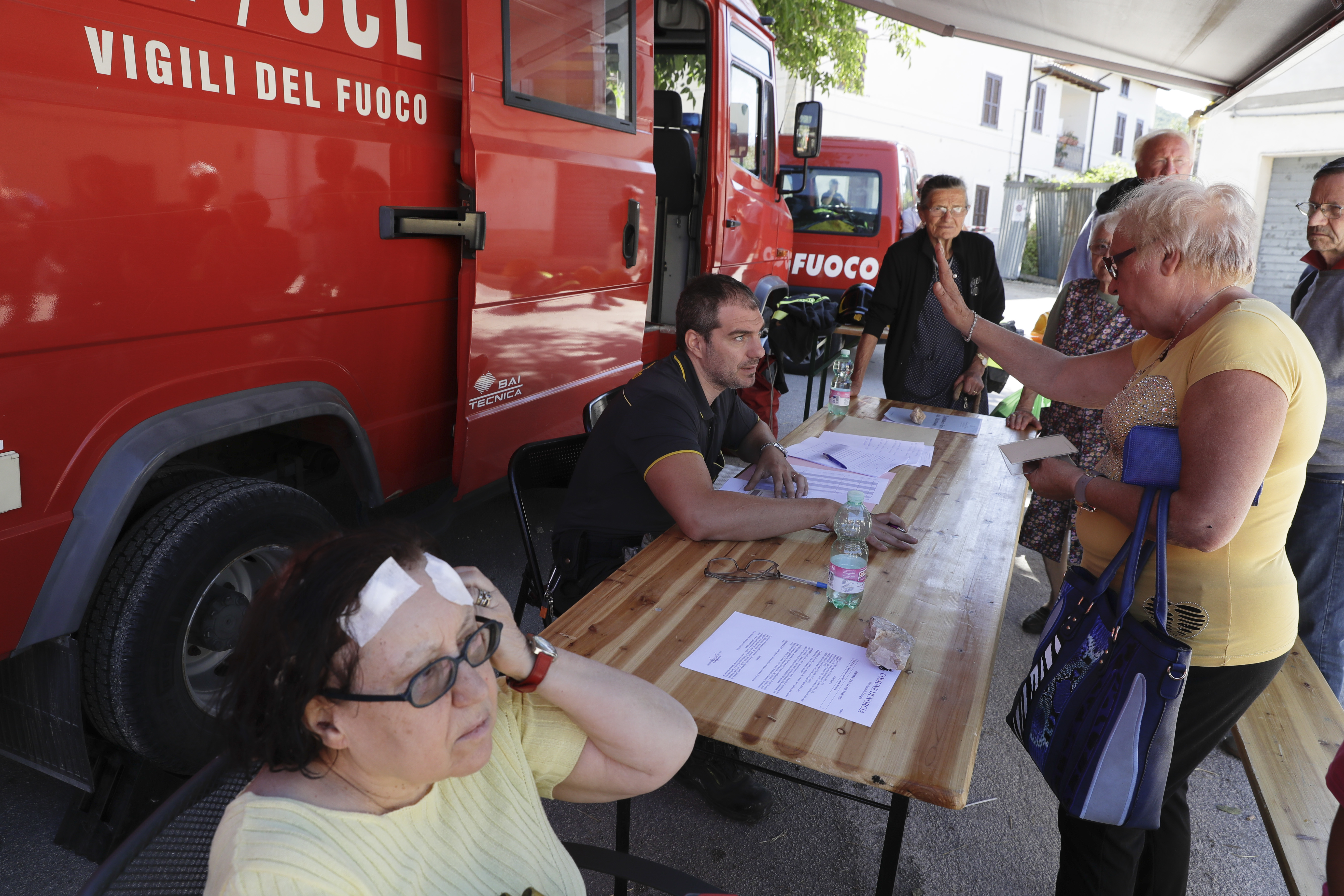 The Latest: Strong aftershock rattles Italy's quake zone