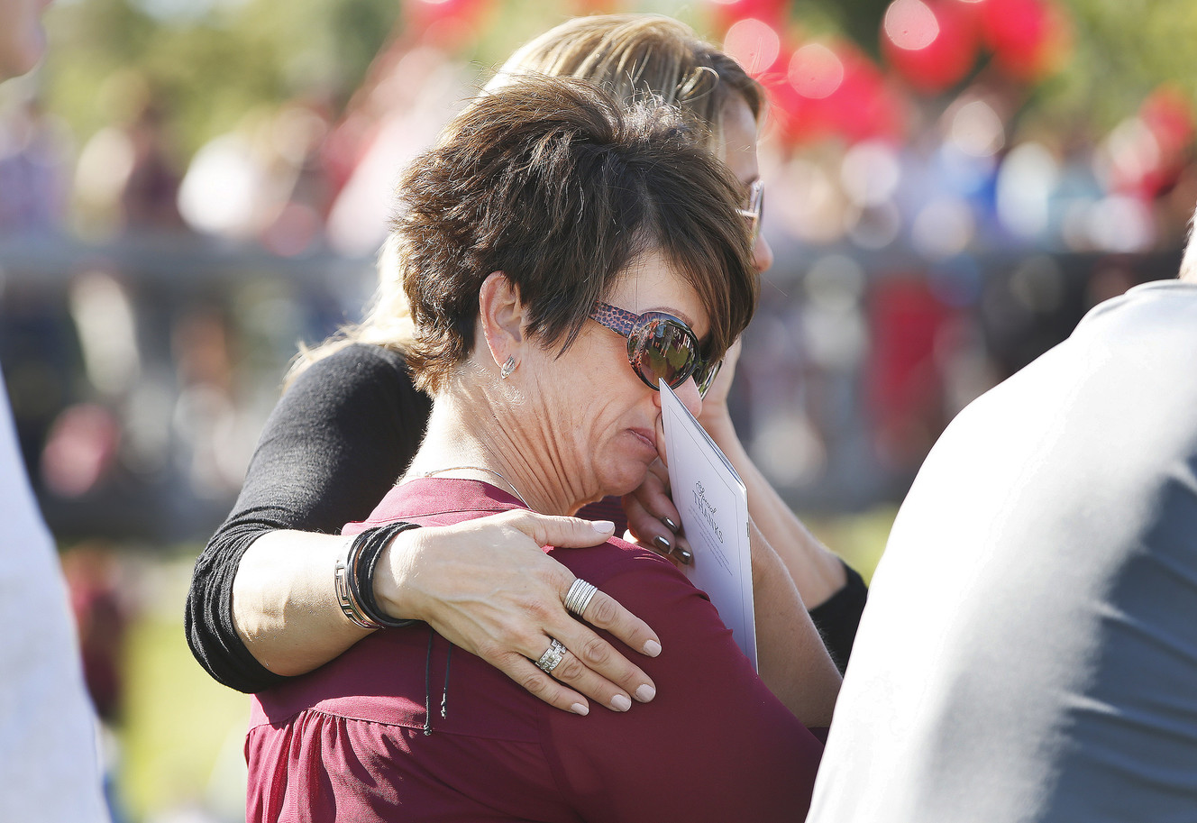 Jennifer German and Wendy Santoro cry during the Celebration of Life Monument Ceremony at Library Square in Salt Lake City on Saturday, Aug. 27, 2016. Nearly 6,700 people have donated their organs and are named on the wall. (Photo: Jeffrey D. Allred, Deseret News)