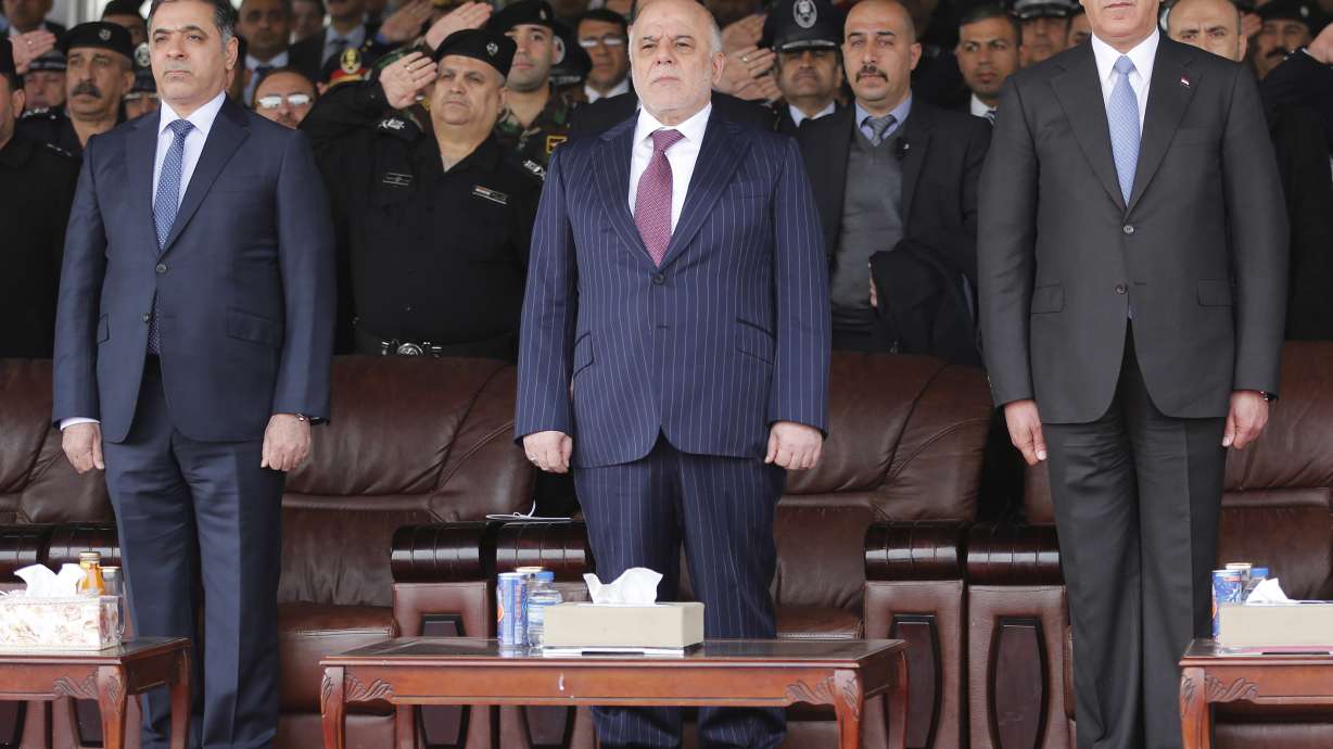 Down another key minister, Iraq continues Mosul push