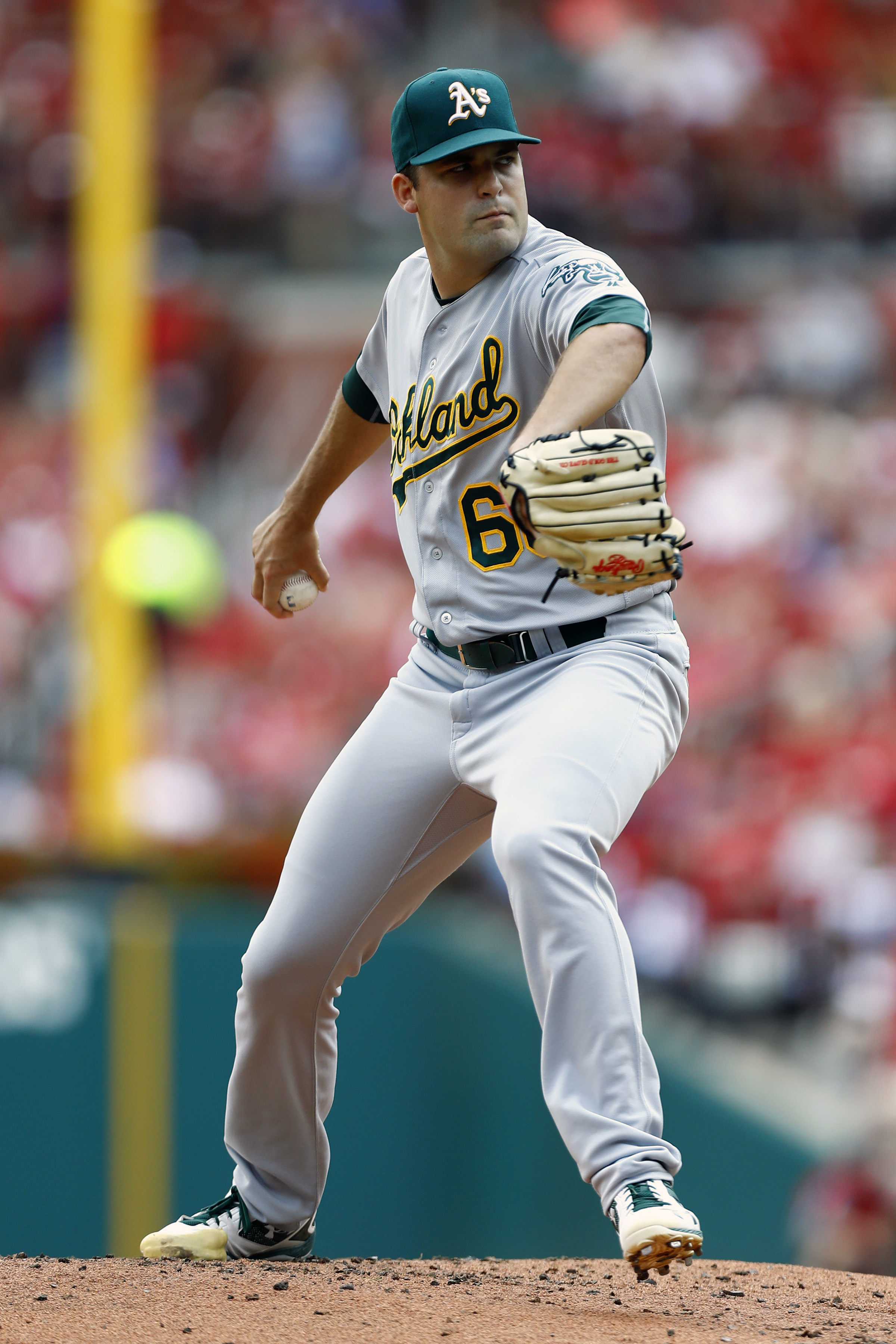 Triggs earns first win as Athletics power past Cardinals 7-4