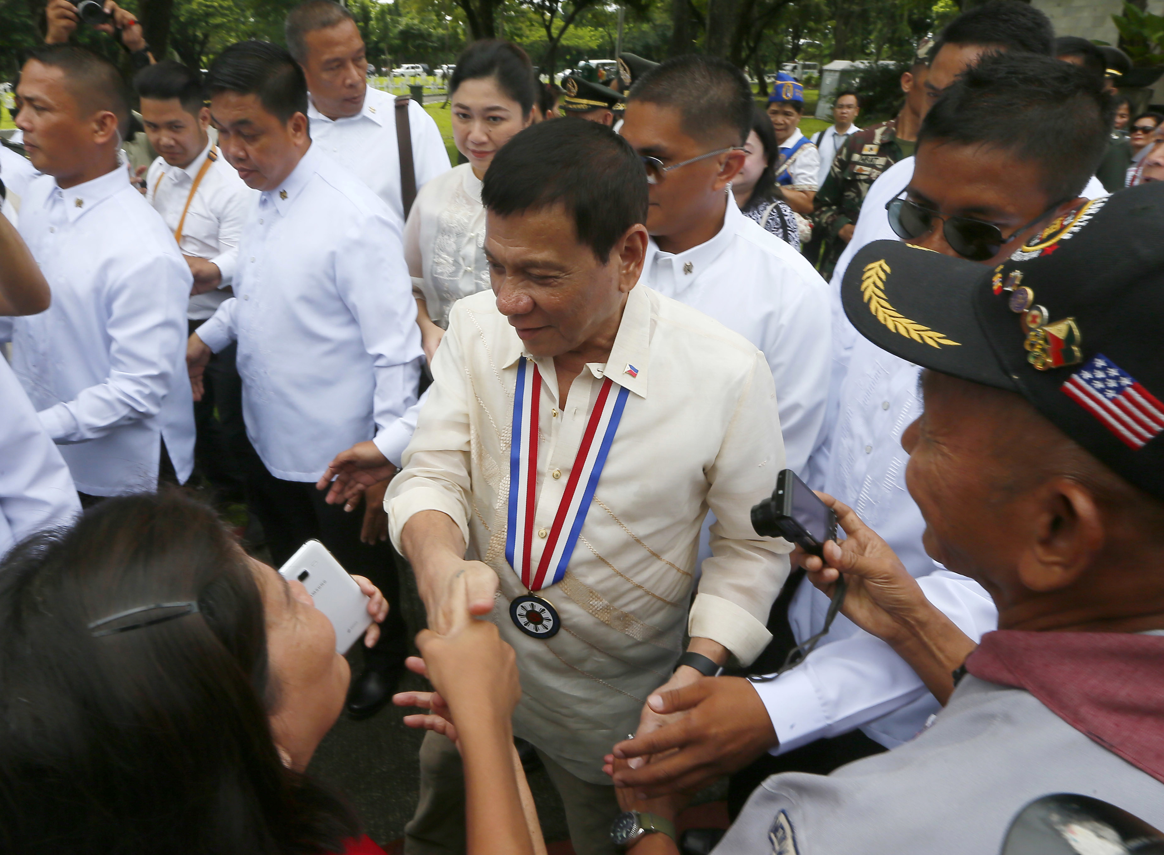 Philippine president says no genocide in his bloody drug war