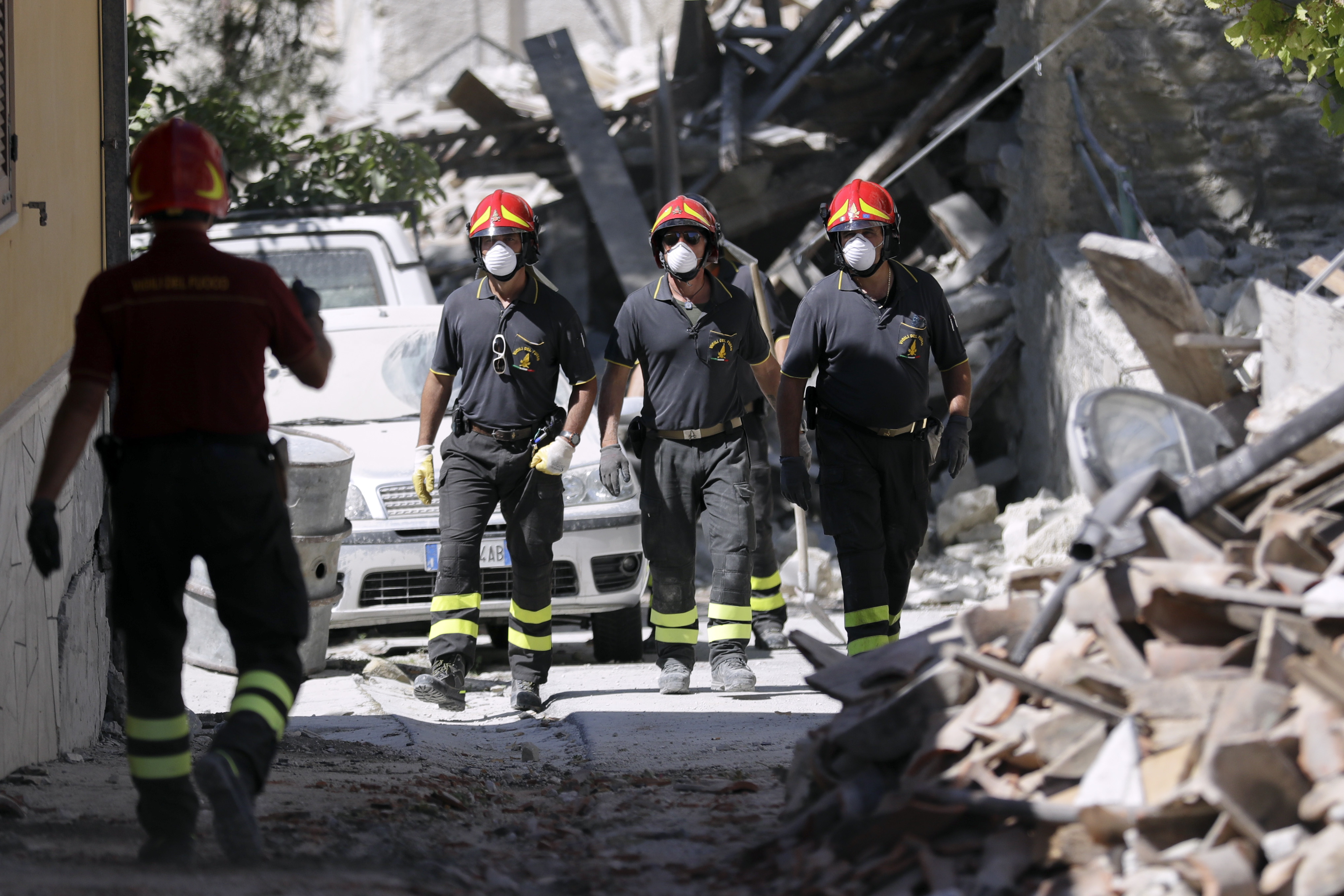 The Latest: 2 arrested in Italy for looting quake-hit homes