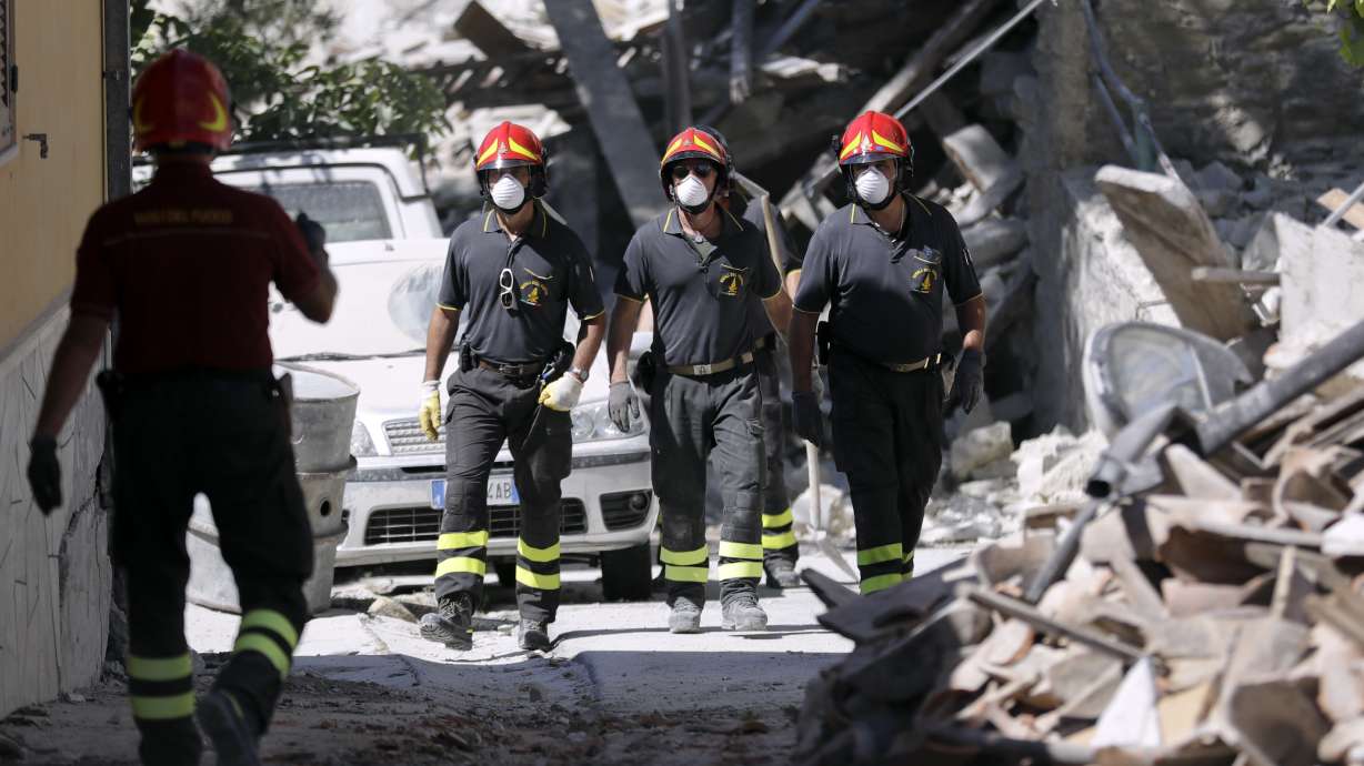 The Latest: 2 arrested in Italy for looting quake-hit homes