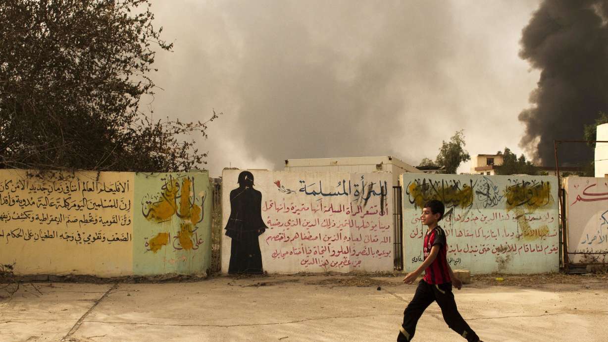Oil wells south of Mosul burn days after key town retaken