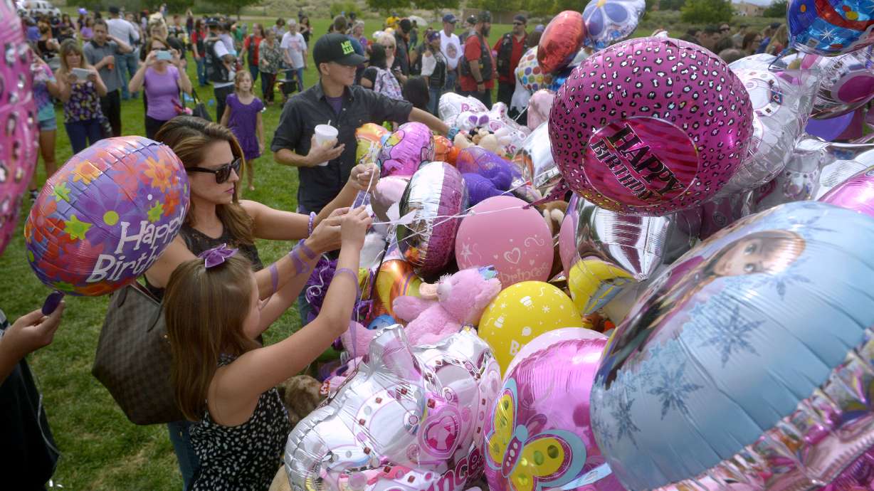 Slain New Mexico girl's relatives mystified over mom's role