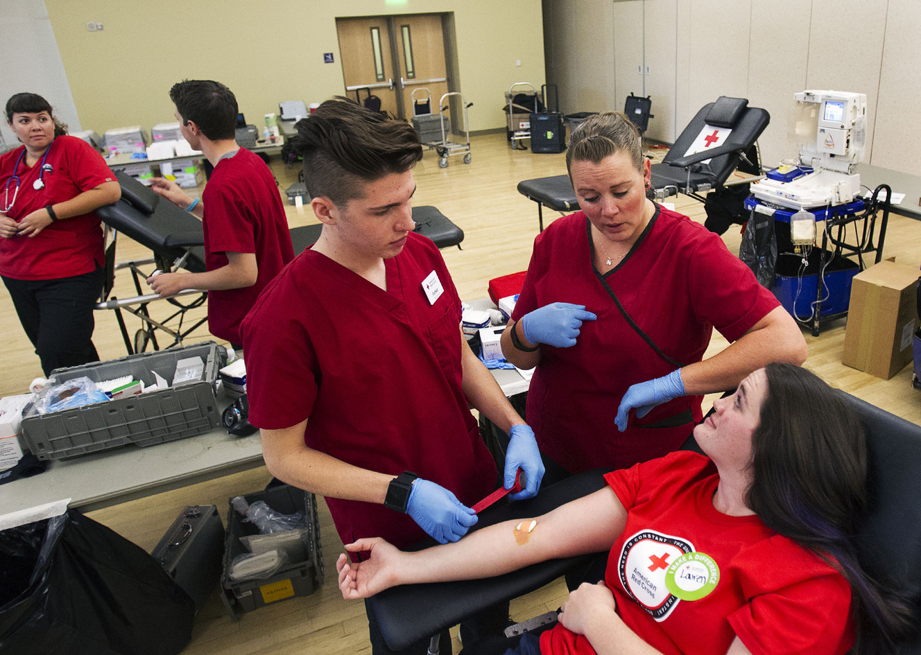 Talise Morgan gives Lauren Backus instructions on how to care for herself after her blood donation at Weber State University in Ogden on Monday, Aug. 29, 2016. (Photo: Hans Koepsell, Deseret News)
