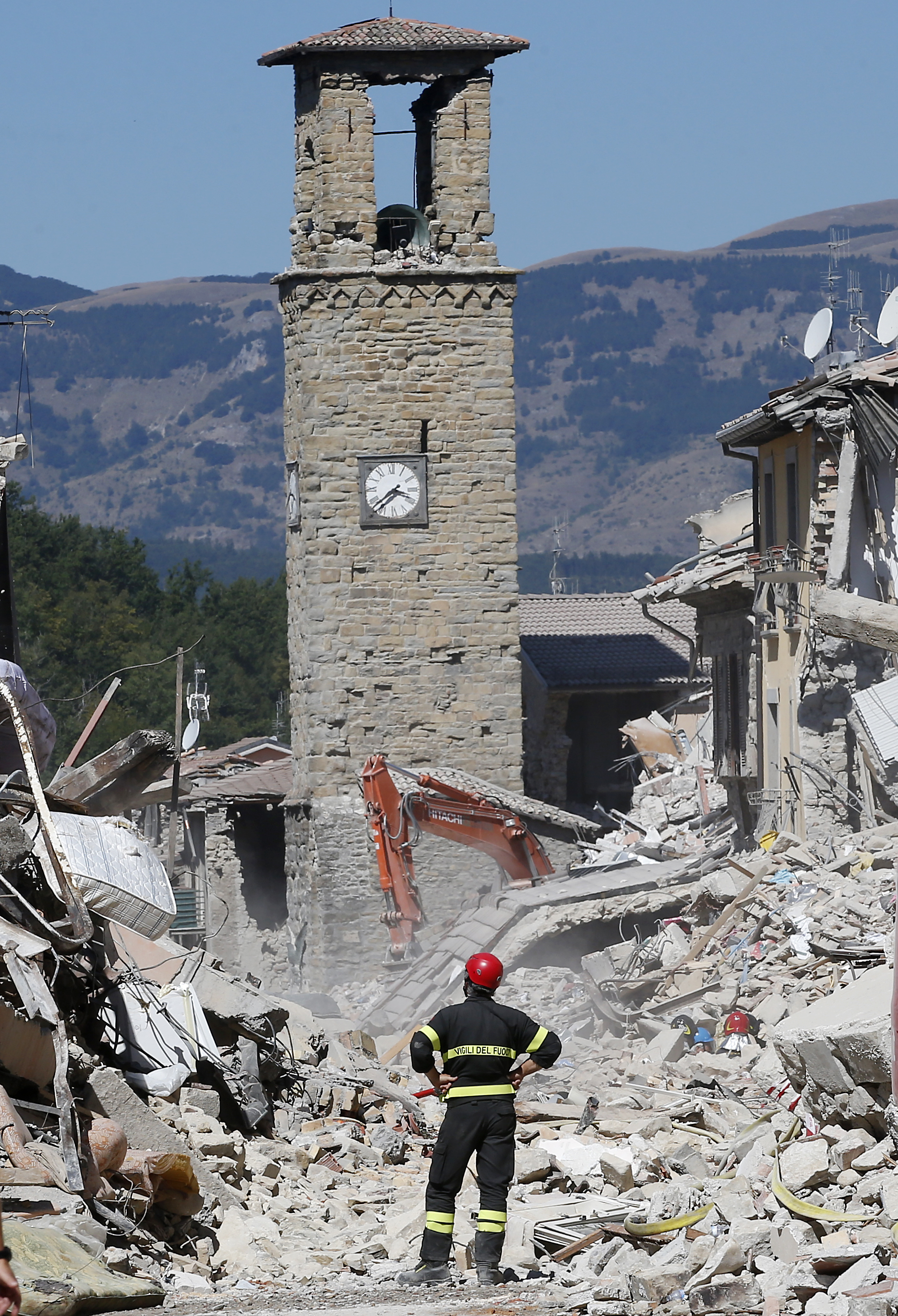 The Latest: Romania to hold day of mourning for quake dead