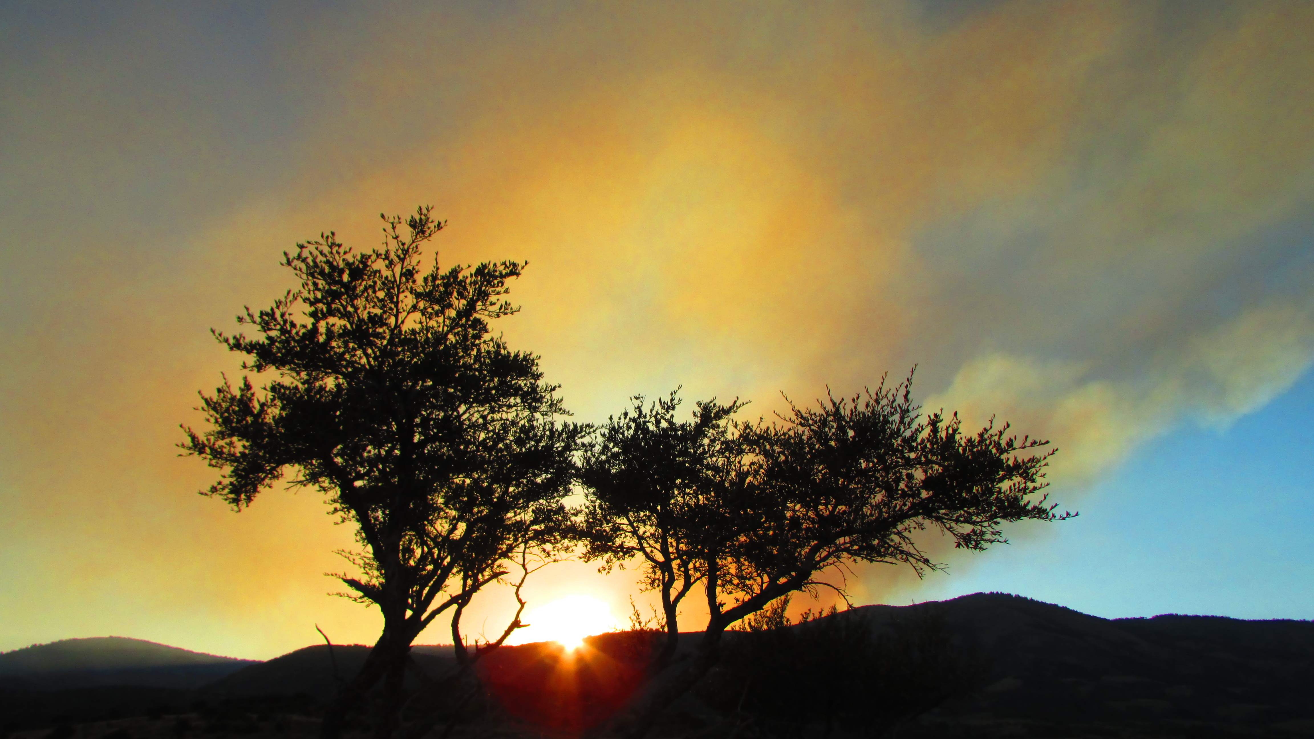 The sunset through the smoke from the Peterson Hollow fire, taken from Garden City. (Photo: Carol Dyer)