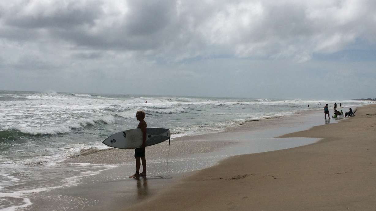 The Latest: Forecasters issue hurricane warning in Florida