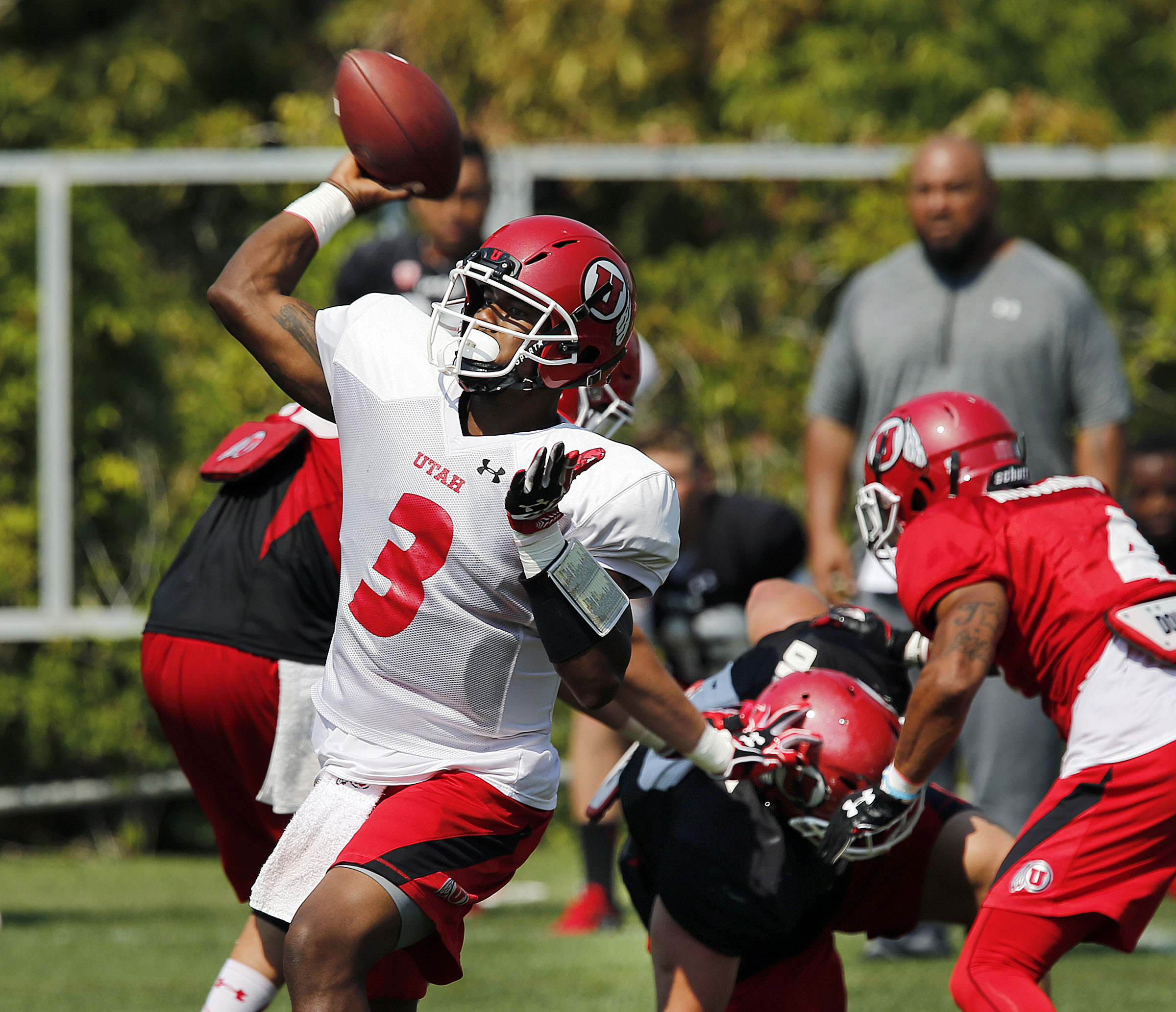 Troy Williams passes the ball during University of Utah football practice in Salt Lake City on Friday, Aug. 19, 2016. (Photo: Ravell Call, Deseret News)