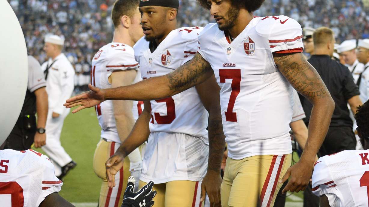 Kaepernick kneels for anthem in 49ers' 31-21 win over Bolts