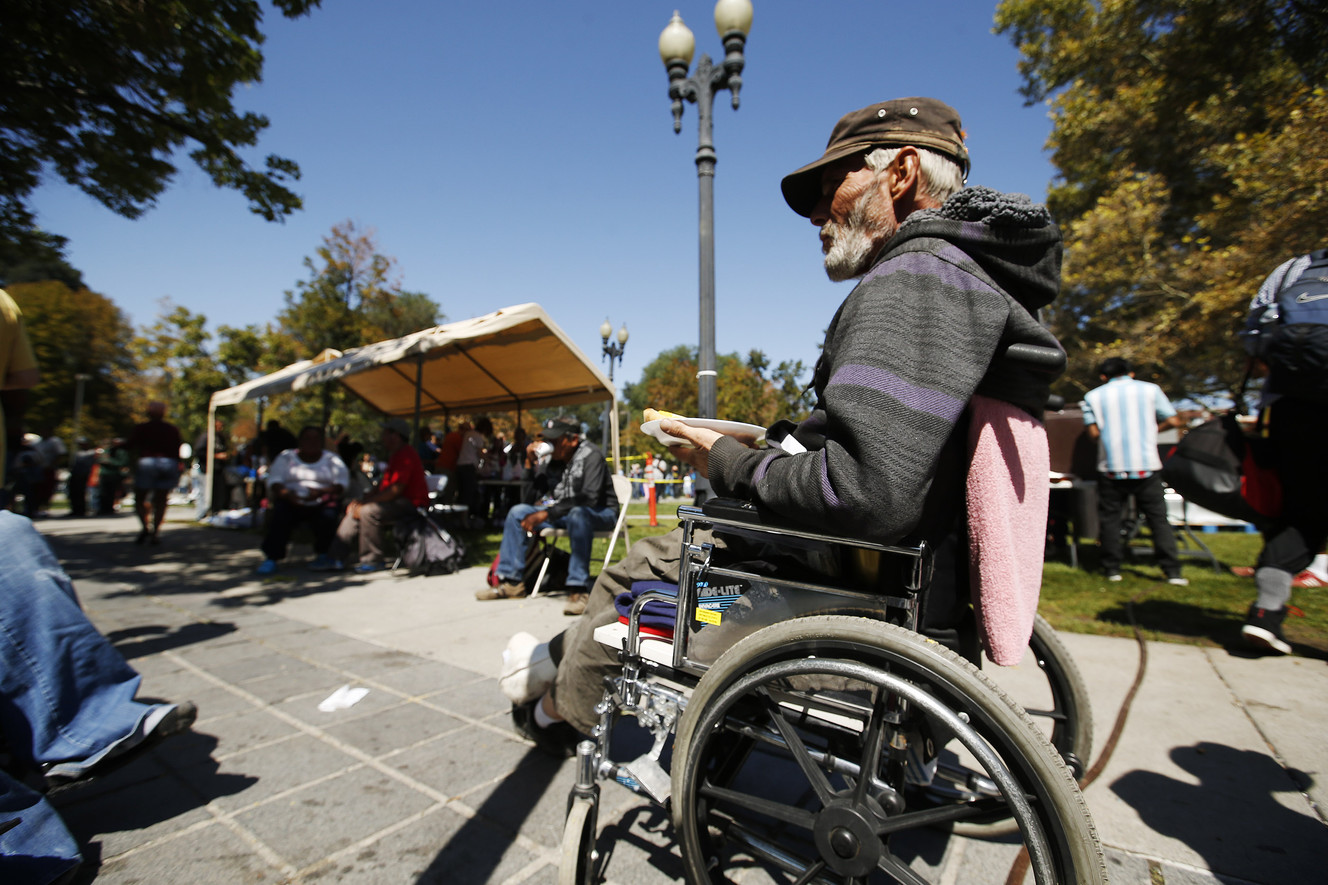 Food is handed out during the Salt Lake City Mission's 23rd annual Labor Day birthday party for the homeless at Pioneer Park in Salt Lake City on Monday, Sept. 5, 2016. (Photo: Jeffrey D. Allred, Deseret News)