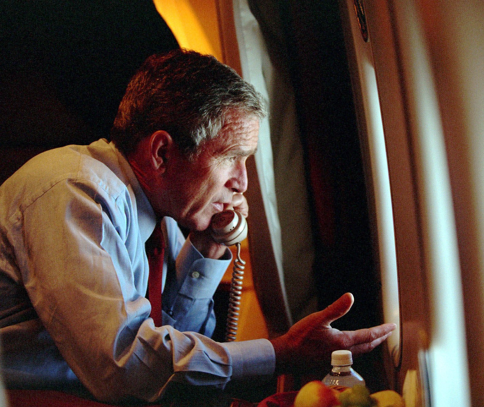 President Bush speaks to Vice President Dick Cheney by phone aboard Air Force One after departing Offutt Air Force Base in Nebraska, Tuesday, Sept. 11, 2001. (Eric Draper, AP Photo/The White House)