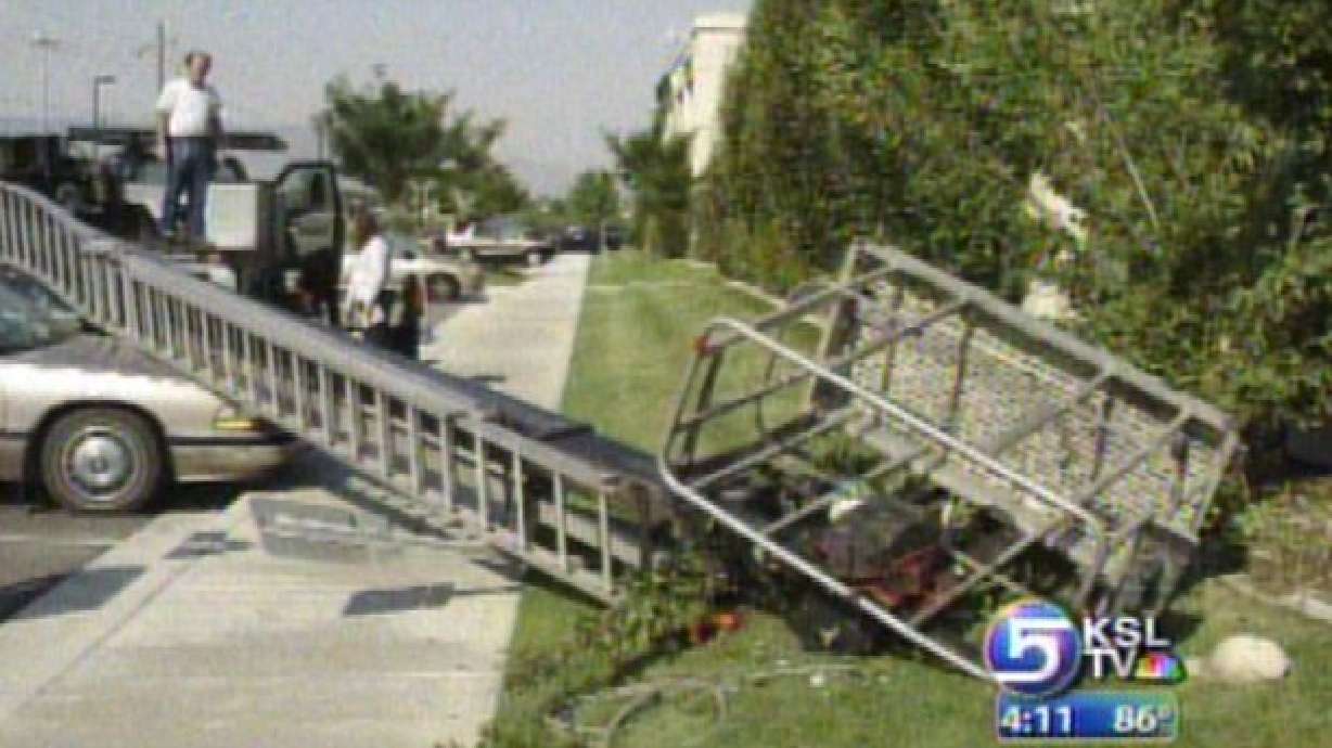 Two Men Injured While Installing Sign