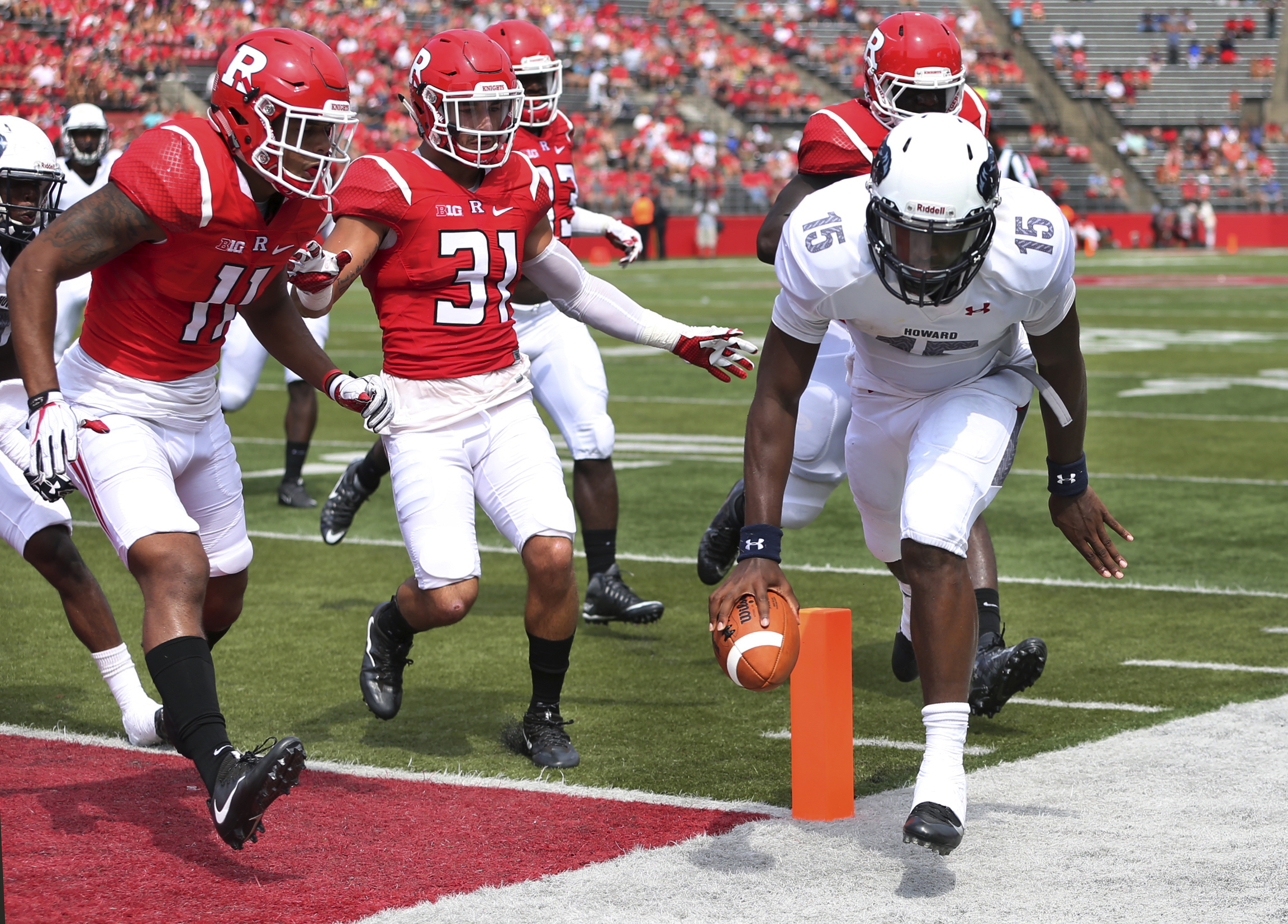 Rutgers rallies from 2 scores down, beats Howard 52-14