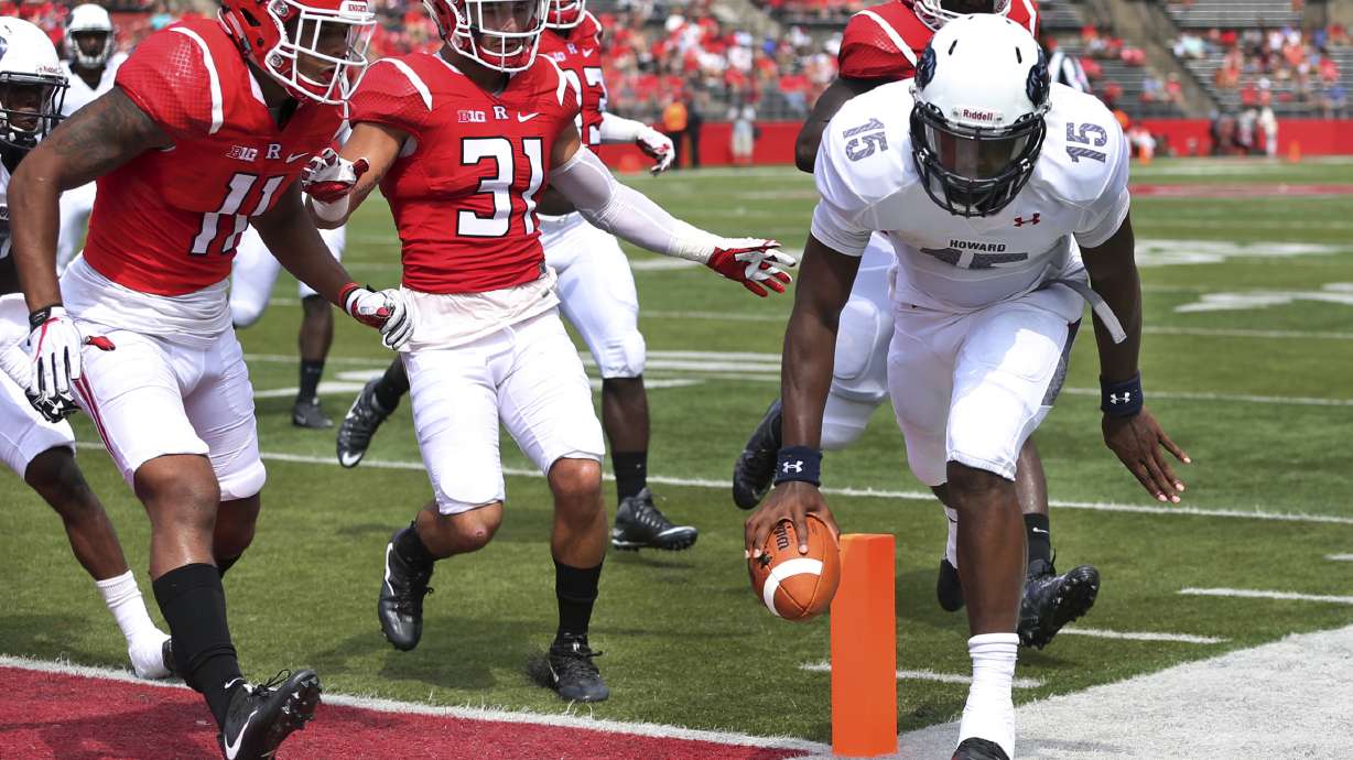 Rutgers rallies from 2 scores down, beats Howard 52-14