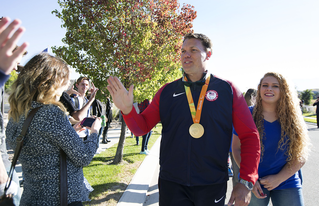 David Blair greets students with his daughter, Alyssa, as he tours Eagle Mountain after returning from the Paralympics in Rio in Eagle Mountain, Monday, Sept. 19, 2016. (Photo: Hans Koepsell, Deseret News)
